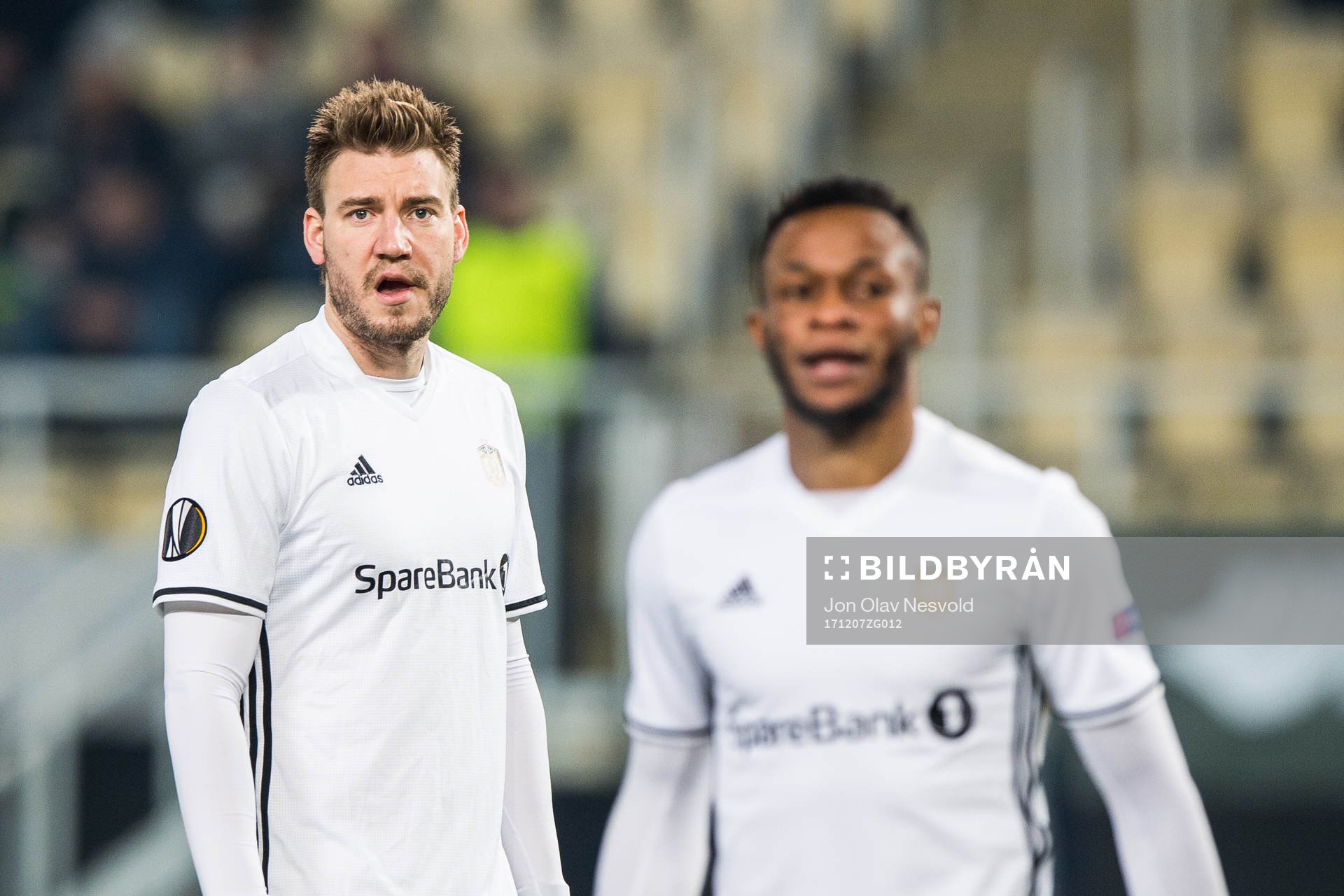 Nicklas Bendtner and Samuel Adegbenro of Rosenborg