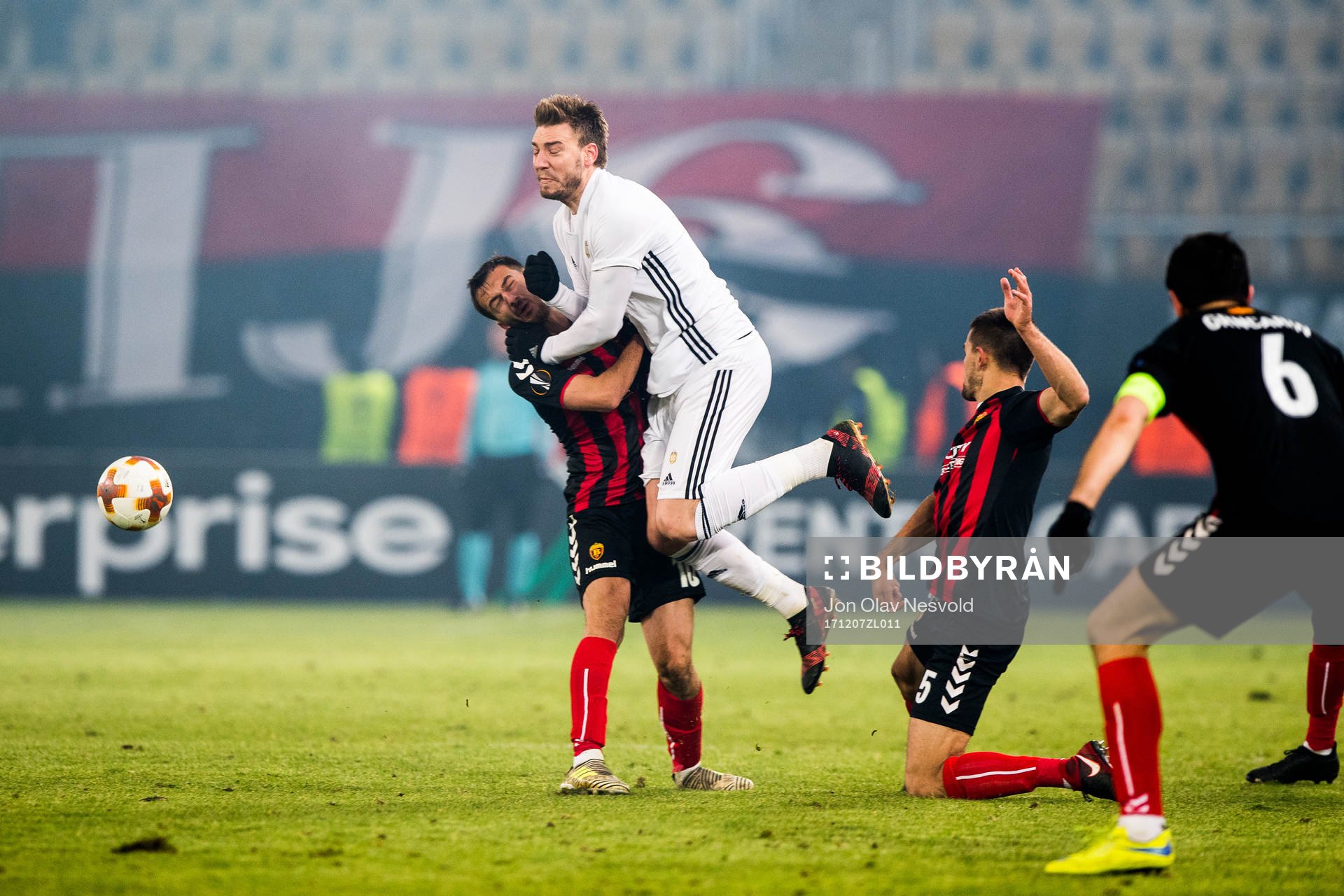 Boban Nikolov of FK Vardar and Nicklas Bendtner of Rosenborg during the Europa League match between FK Vardar and Rosenborg on December 7, 2017 in Skopje.