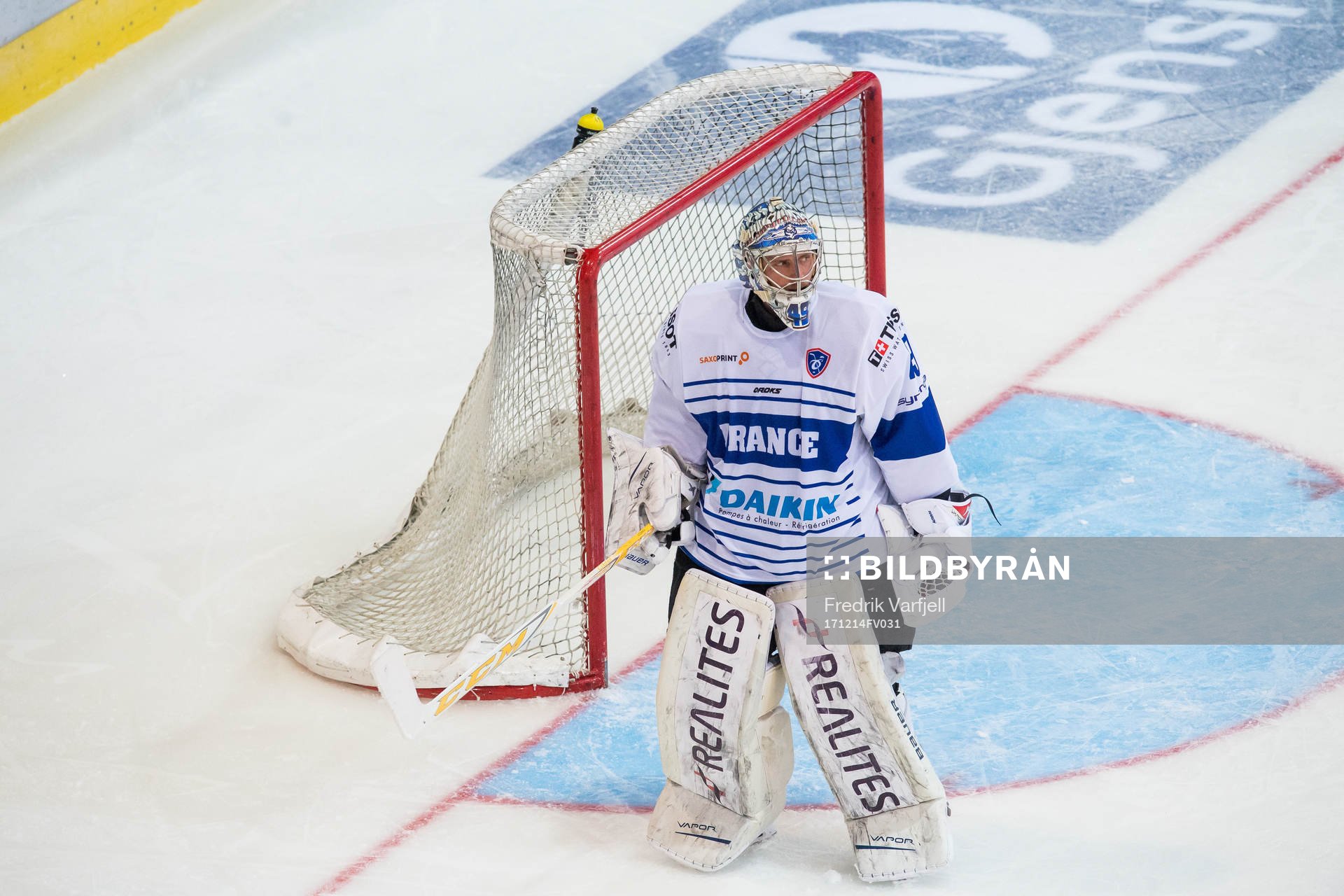 Goaltender Florian Hardy  of France looks dejected