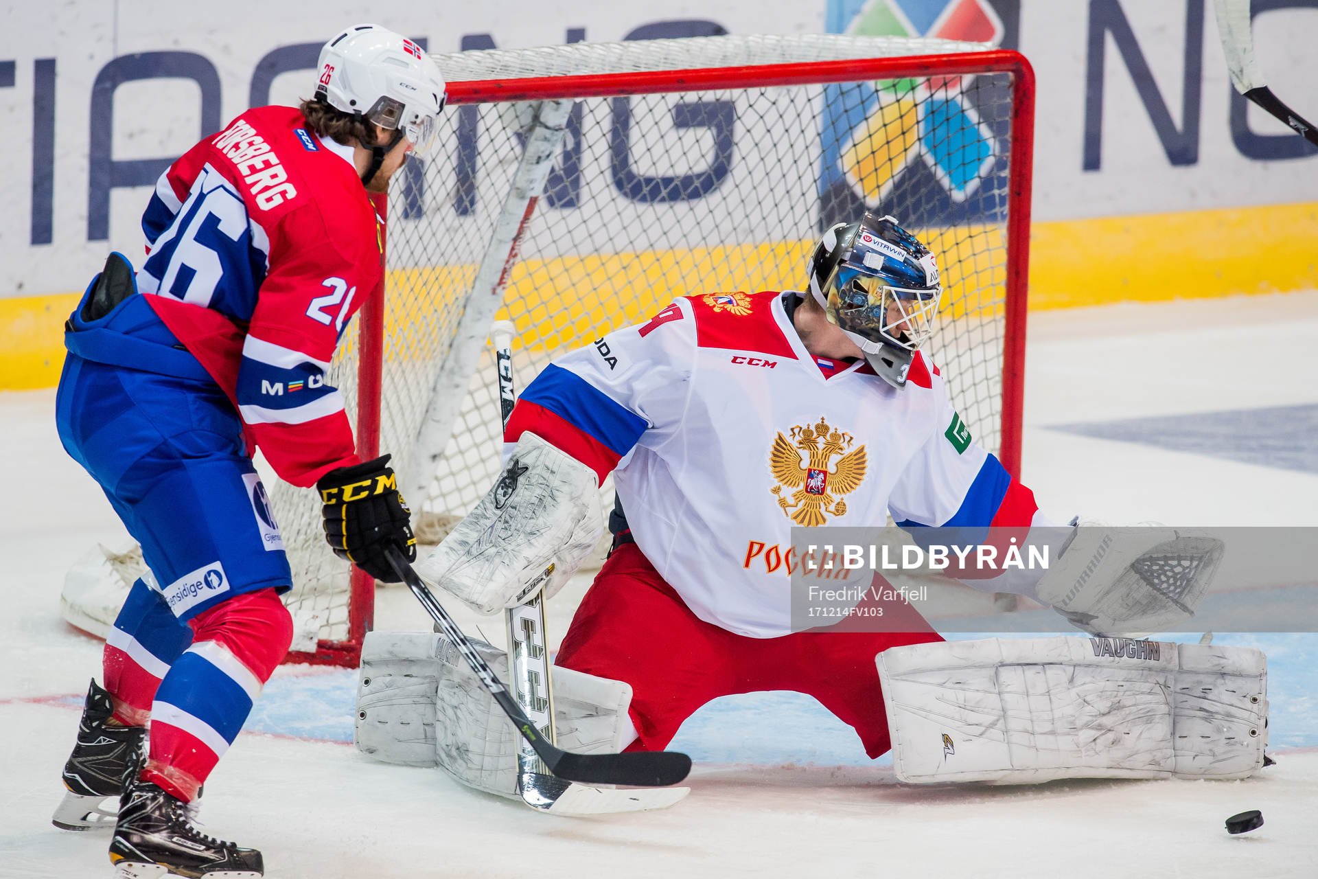 Kristian Forsberg of Norway and goaltender Aleksandr
