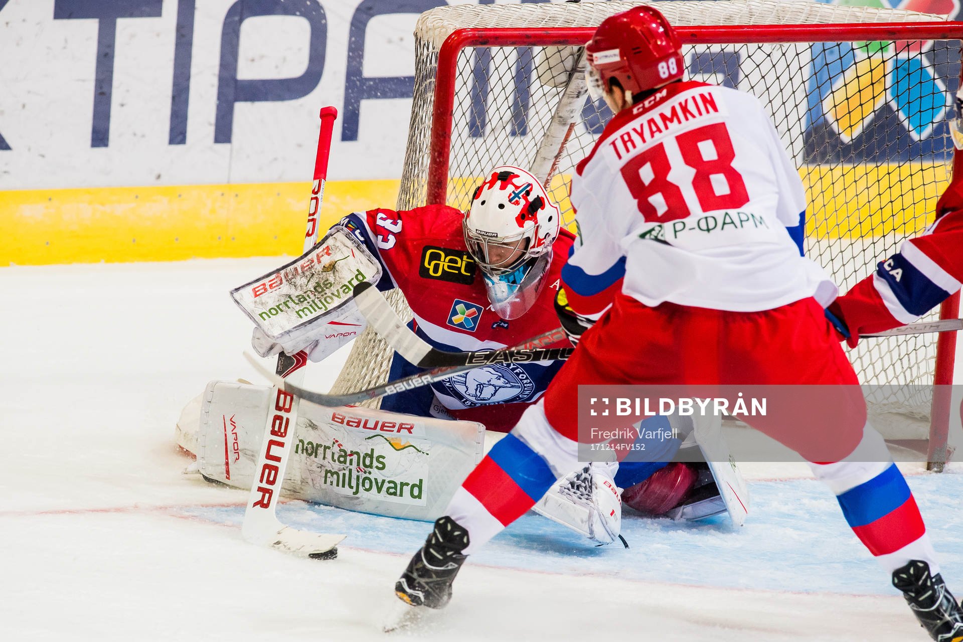 Goaltender Henrik Haukeland of Norway and Nikitia Tryamkin