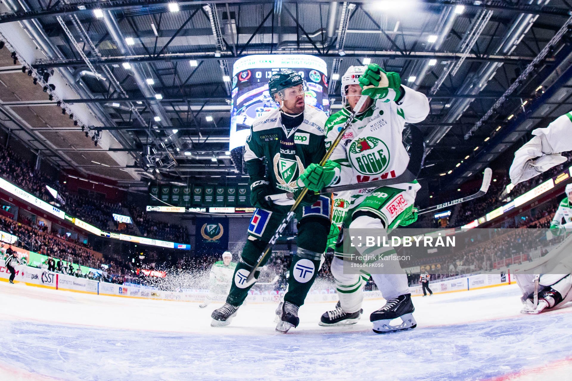 Färjestads Dick Axelsson och Rögles Ben Youds
