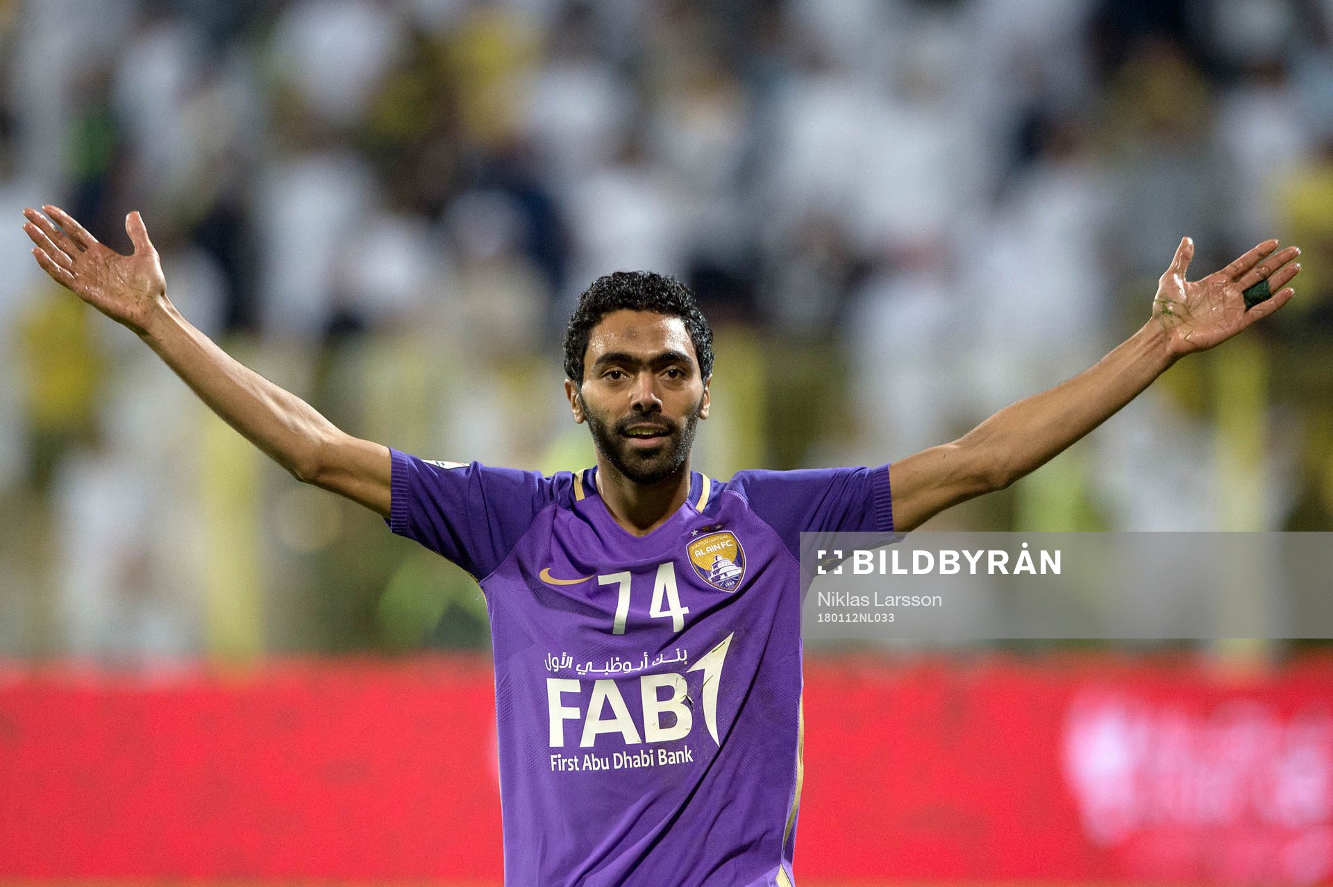 Al Ains Husain El Shahat jublar efter att han gjort mål under matchen mellan Al Wasl och Al Ain den 12 januari 2018 i Dubai.