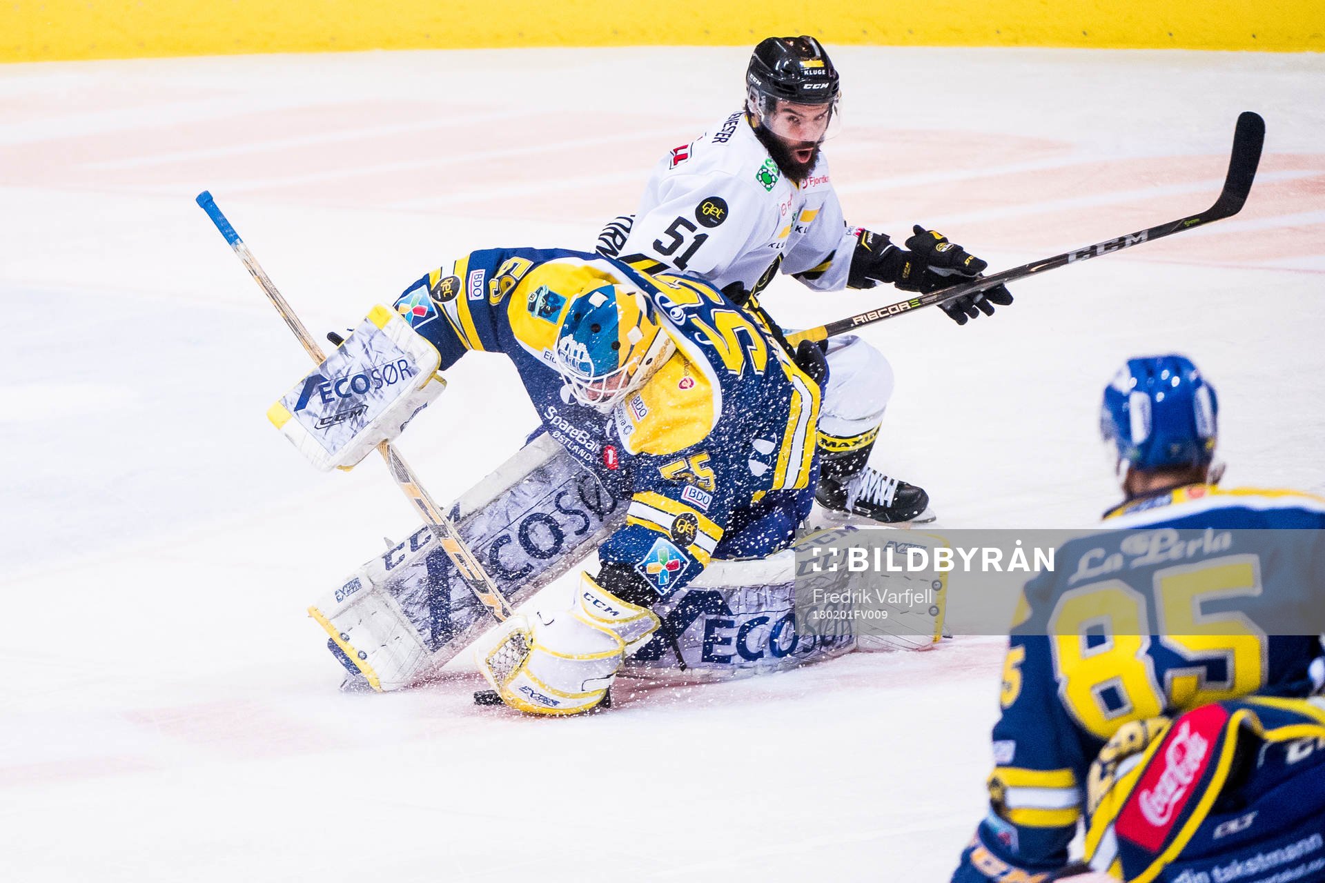 Goaltender Oskar Östlund of Storhamar and Philippe Cornet