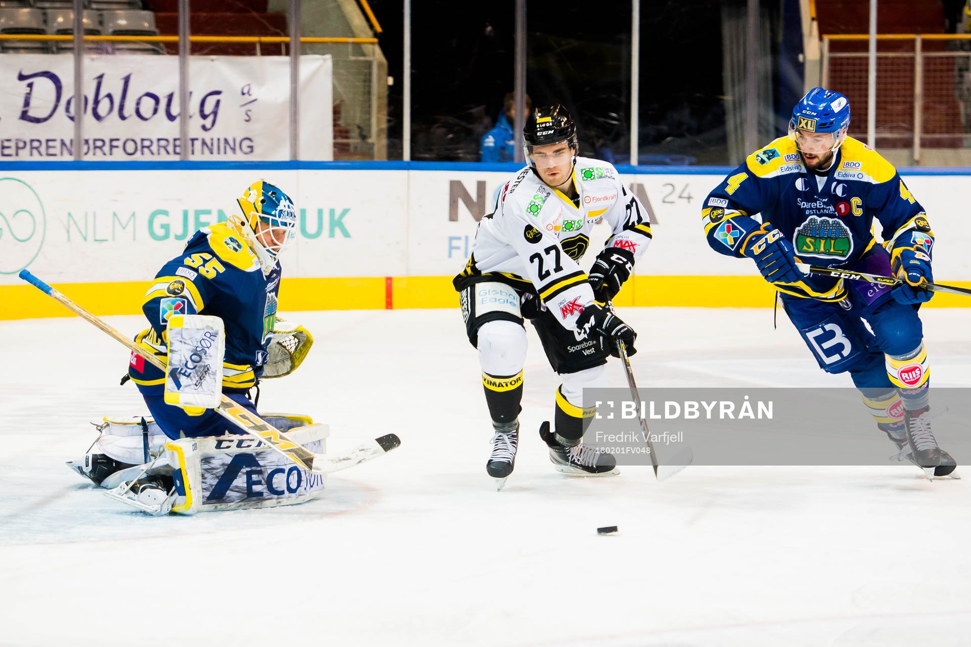Goaltender Oskar Östlund of Storhamar, Henrik Medhus of