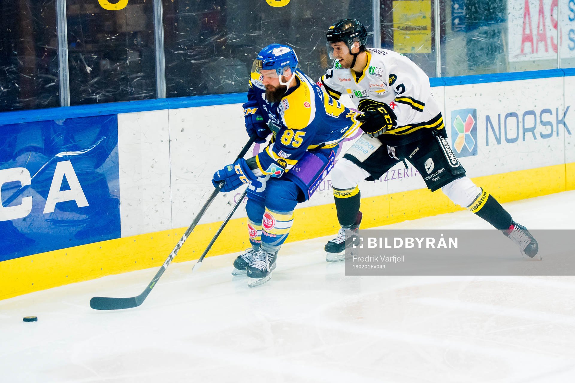 Lars Erik Hesbråten of Storhamar and Eirik Østrem Salsten