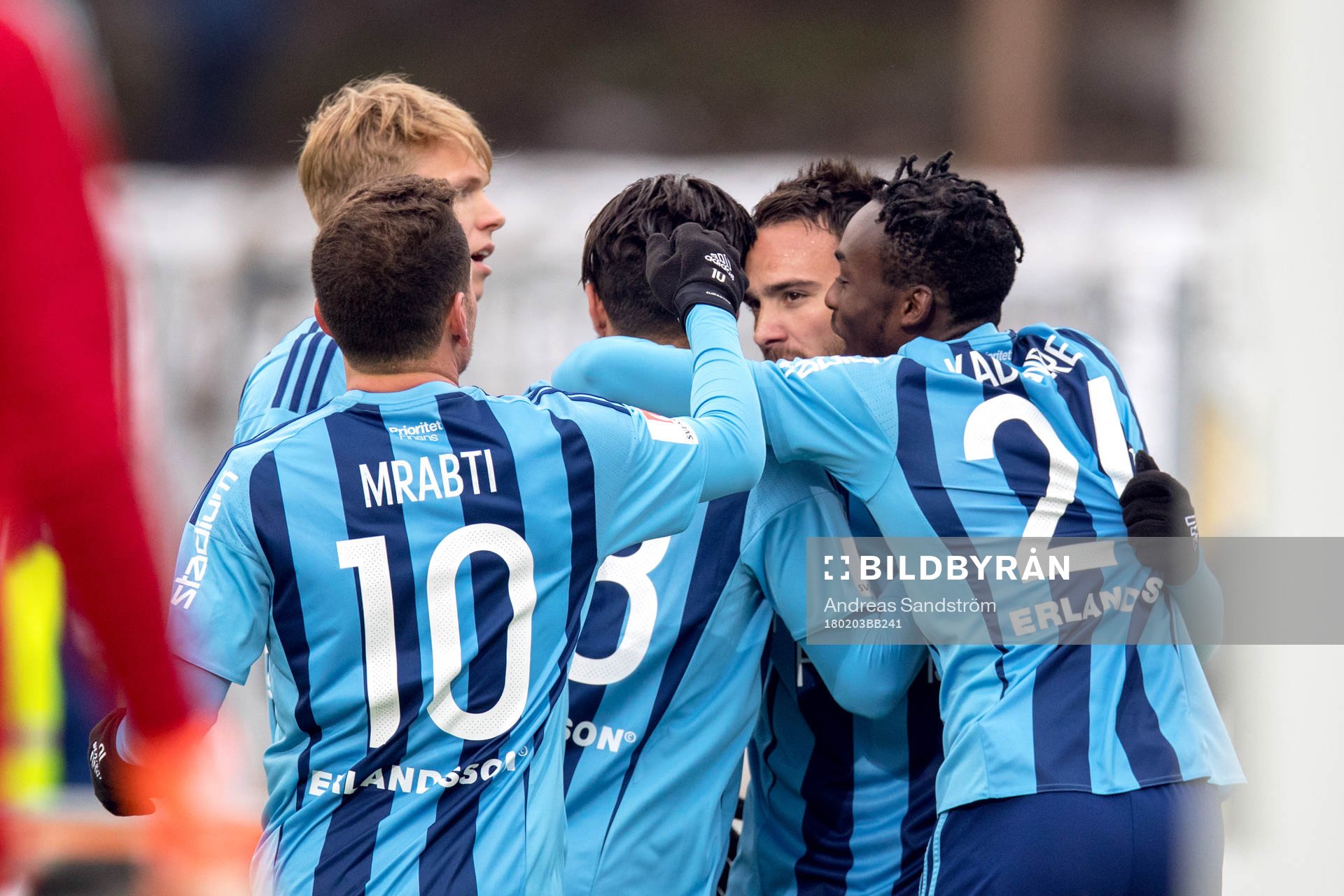 Djurgårdens Dzenis Kozica jublar med lagkamrater efter 1-1 under en träningsmatch i fotboll mellan Djurgården och HJK Helsingfors den 3 Februari 2018 i Stockholm.