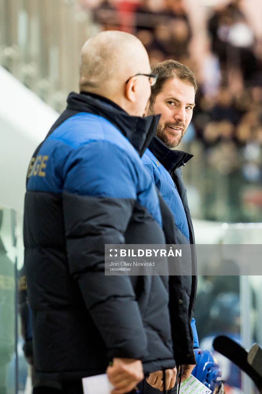 Leif Boork, head coach of Sweden, and Jared Cipparone,