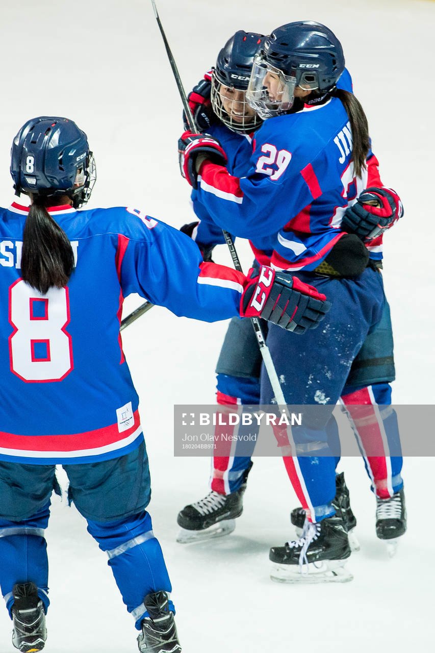 Park Jongah and Lee Jingyu celebrate the 2-1 goal