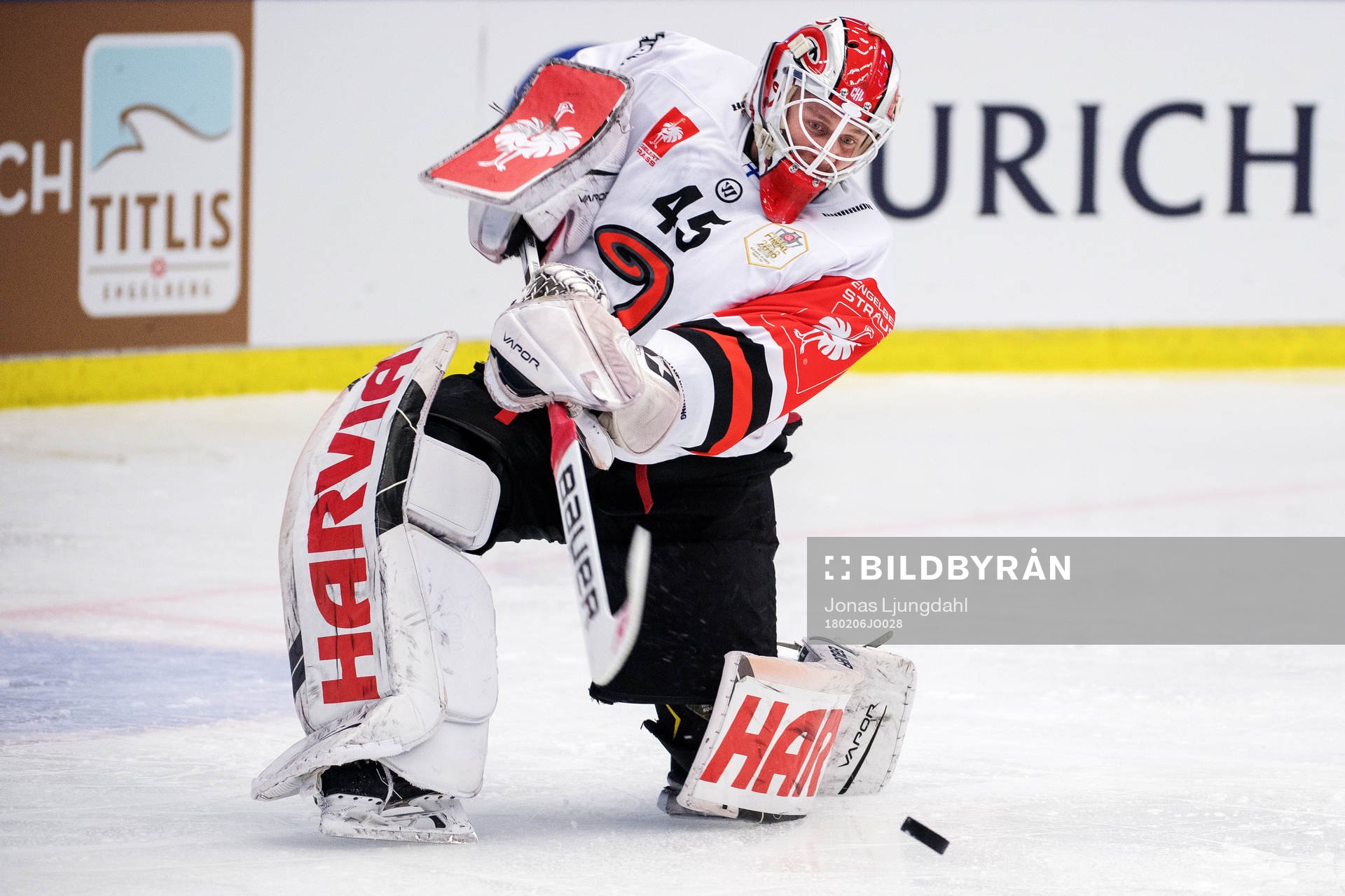 Jyväskyläs goalkeeper Juho Olkinuora clears the puck