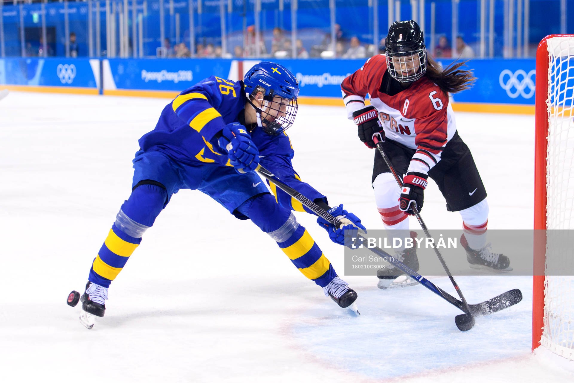 A shot from Hanna Olsson of Sweden is blocked by Sena