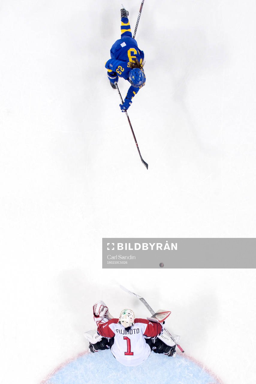 Rebecca Stenberg of Sweden shot the puck against goaltender