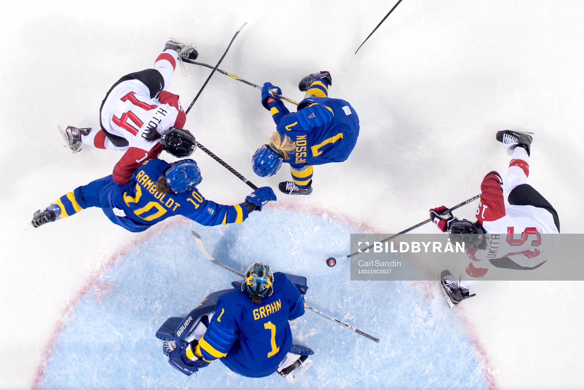 Rui Ukita of Japan scores 1-1 behind goaltender Sara Grahn