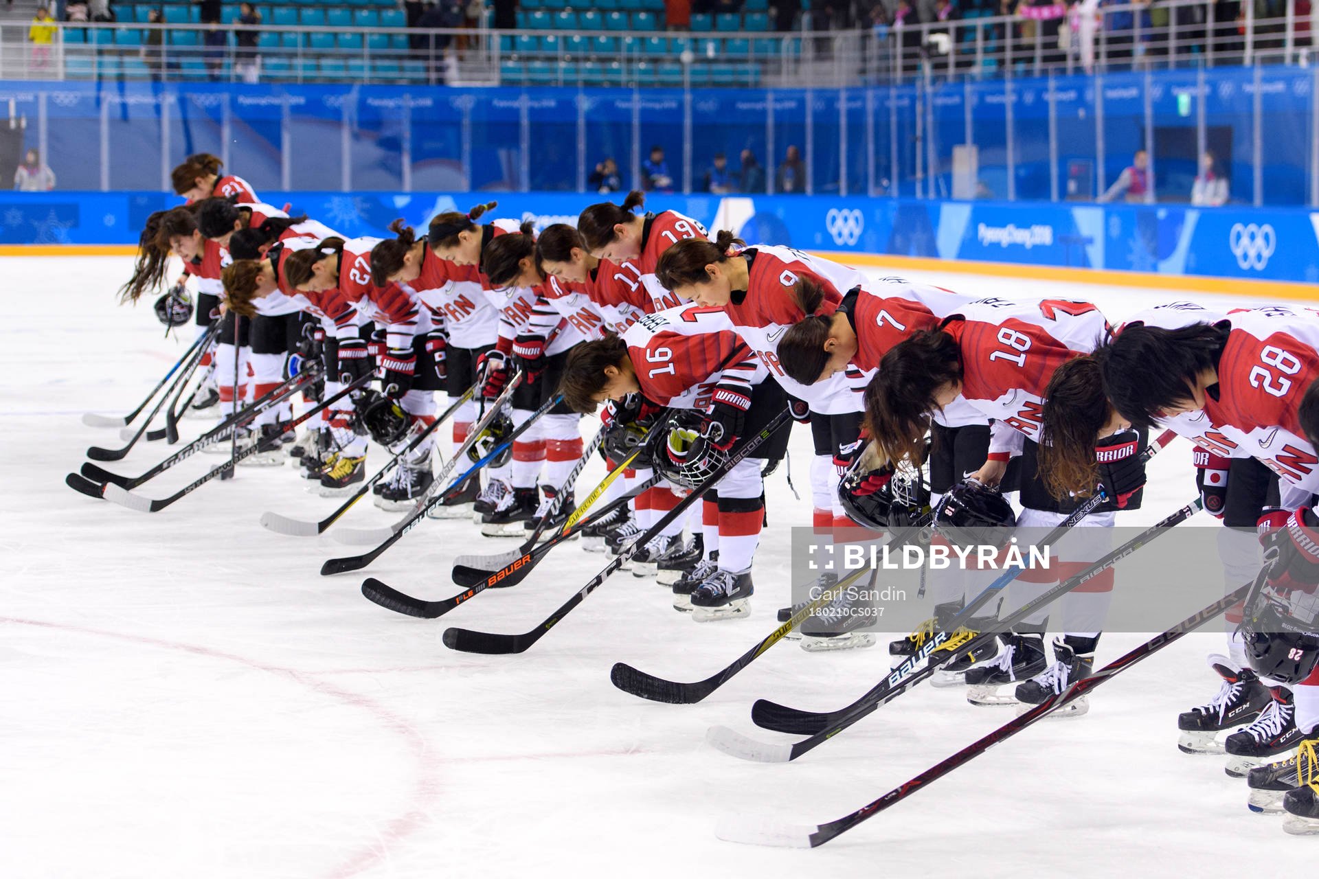 The Japanese players bow for the spectators