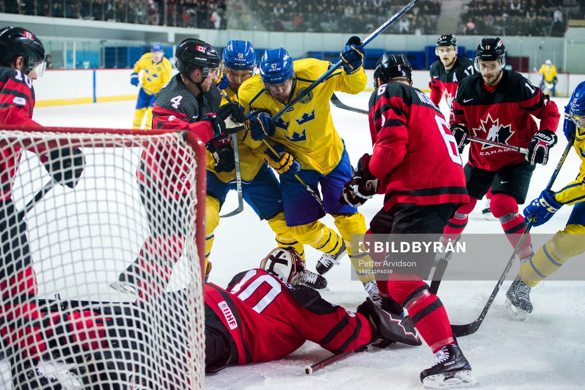 Anton Lander and Linus Omark of Sweden against Goaltender