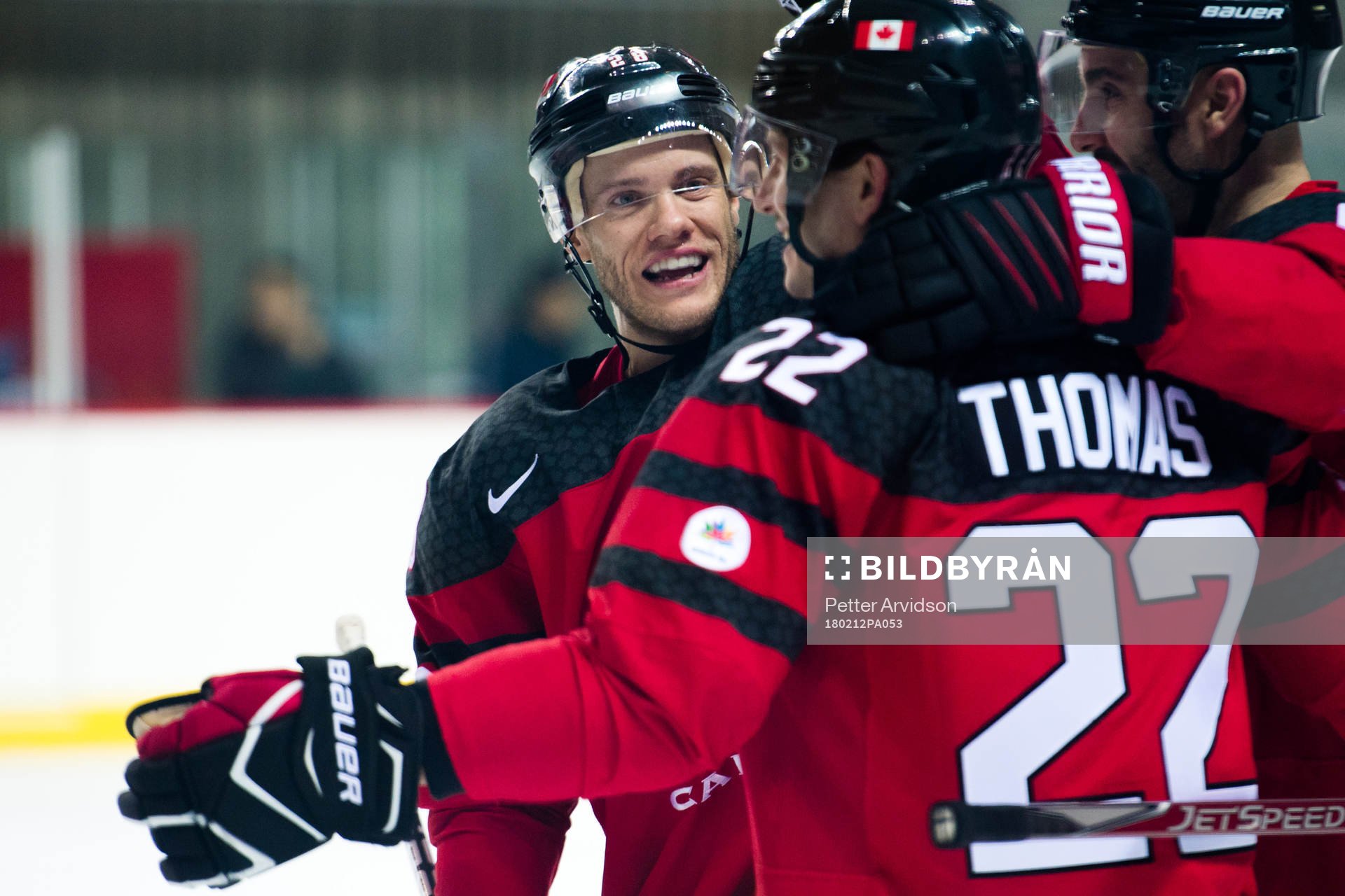 Christian Thomas of Canada celebrates with Mat Robinson
