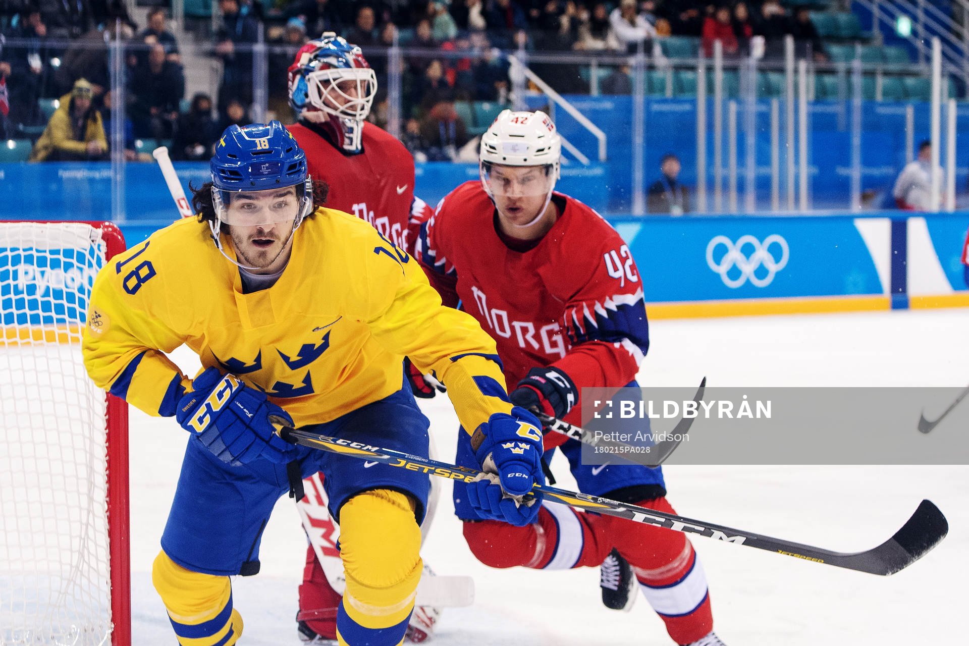 Dennis Everberg of Sweden and Goaltender Lars Haugen as