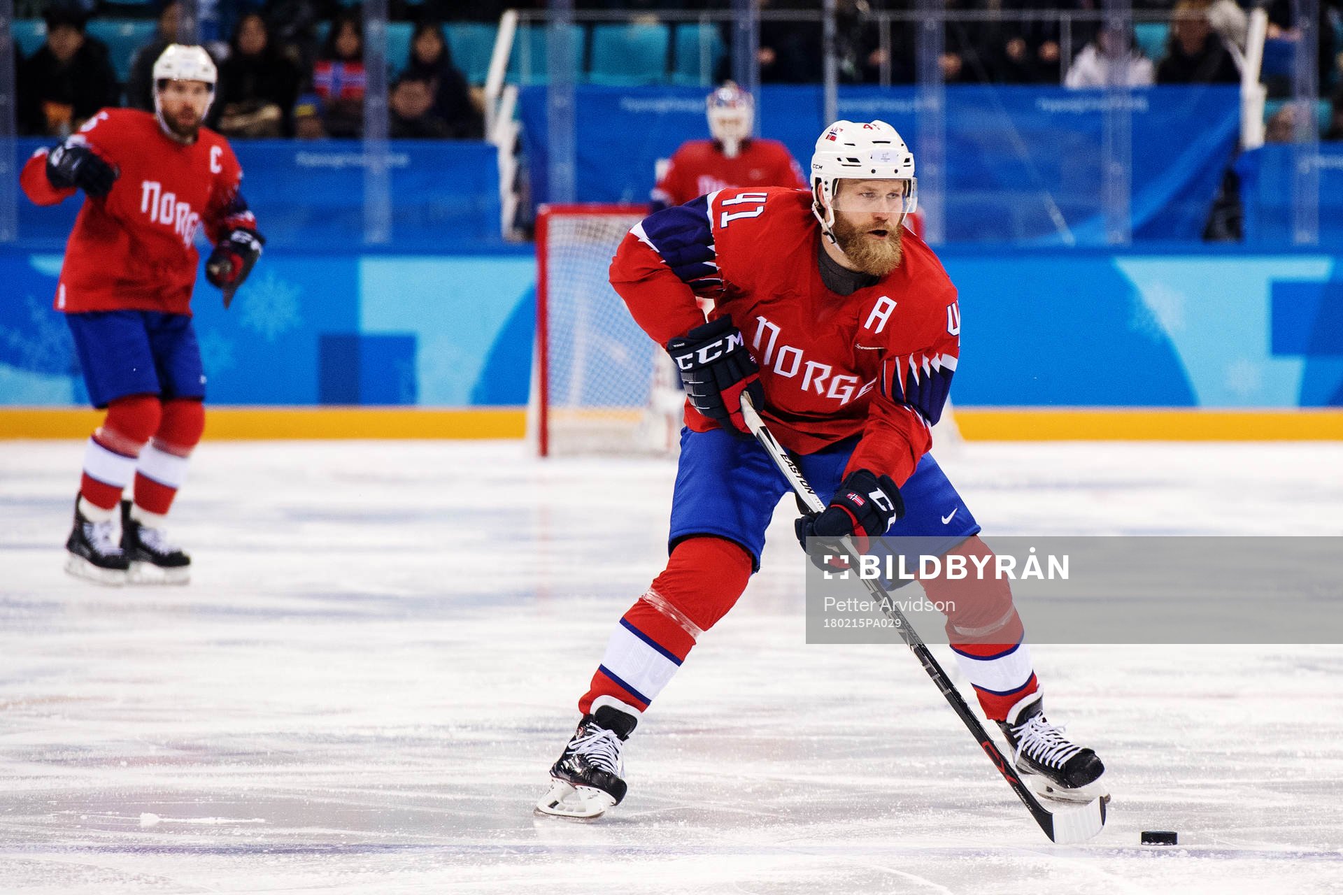 Patrick Thoresen of Norway with the puck in the Men's Ice