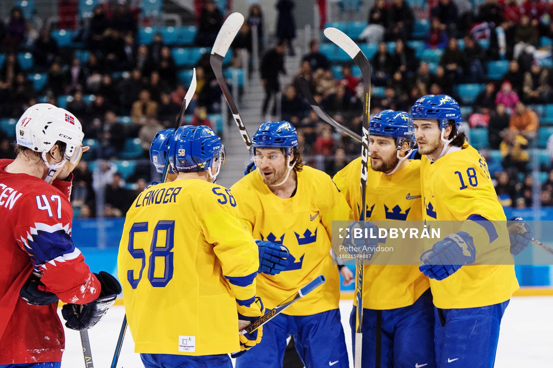 Mikael Wikstrand of Sweden celebrate with team mates