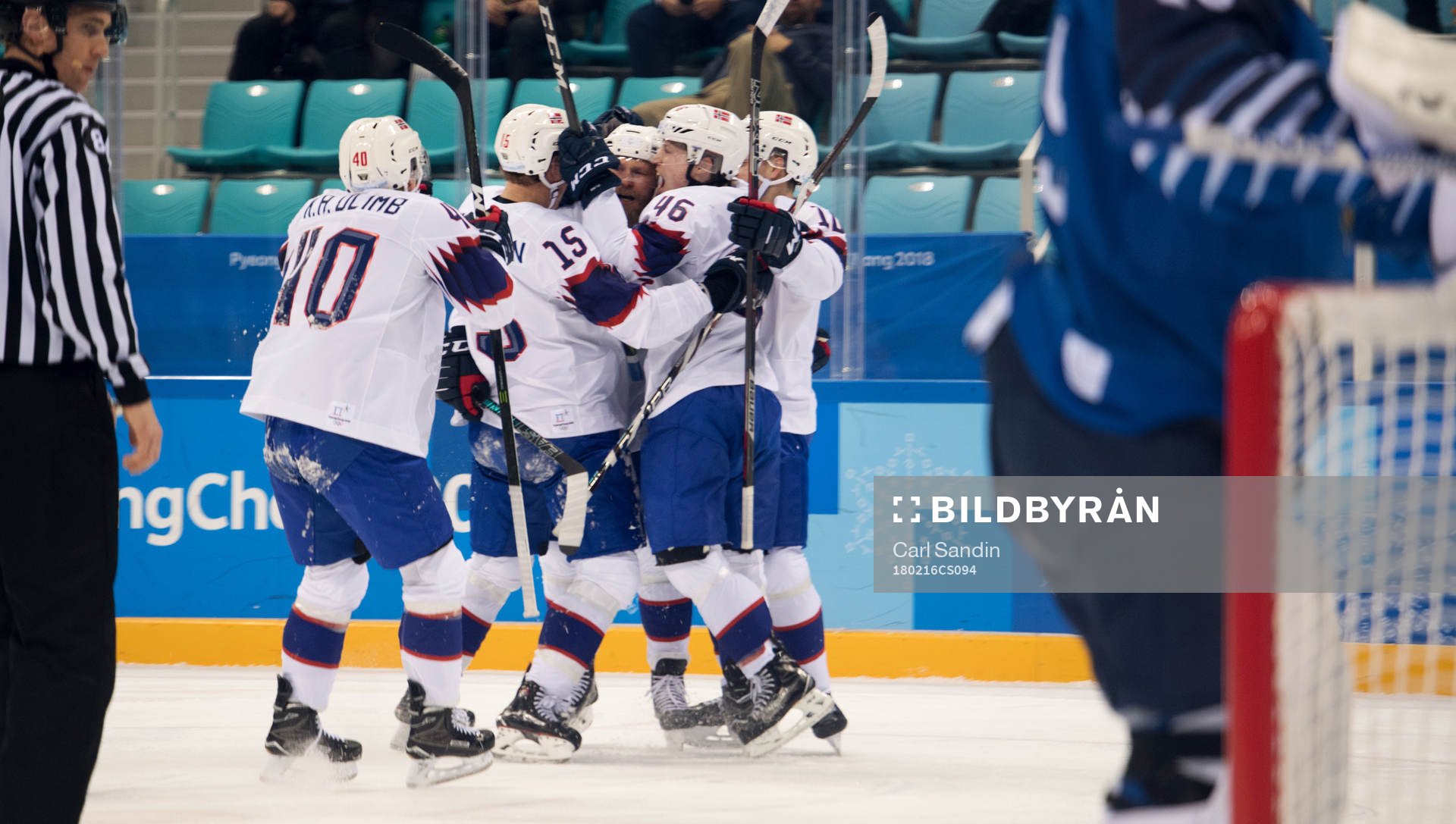 Team of Norway celebrates a goal in the ice hockey game