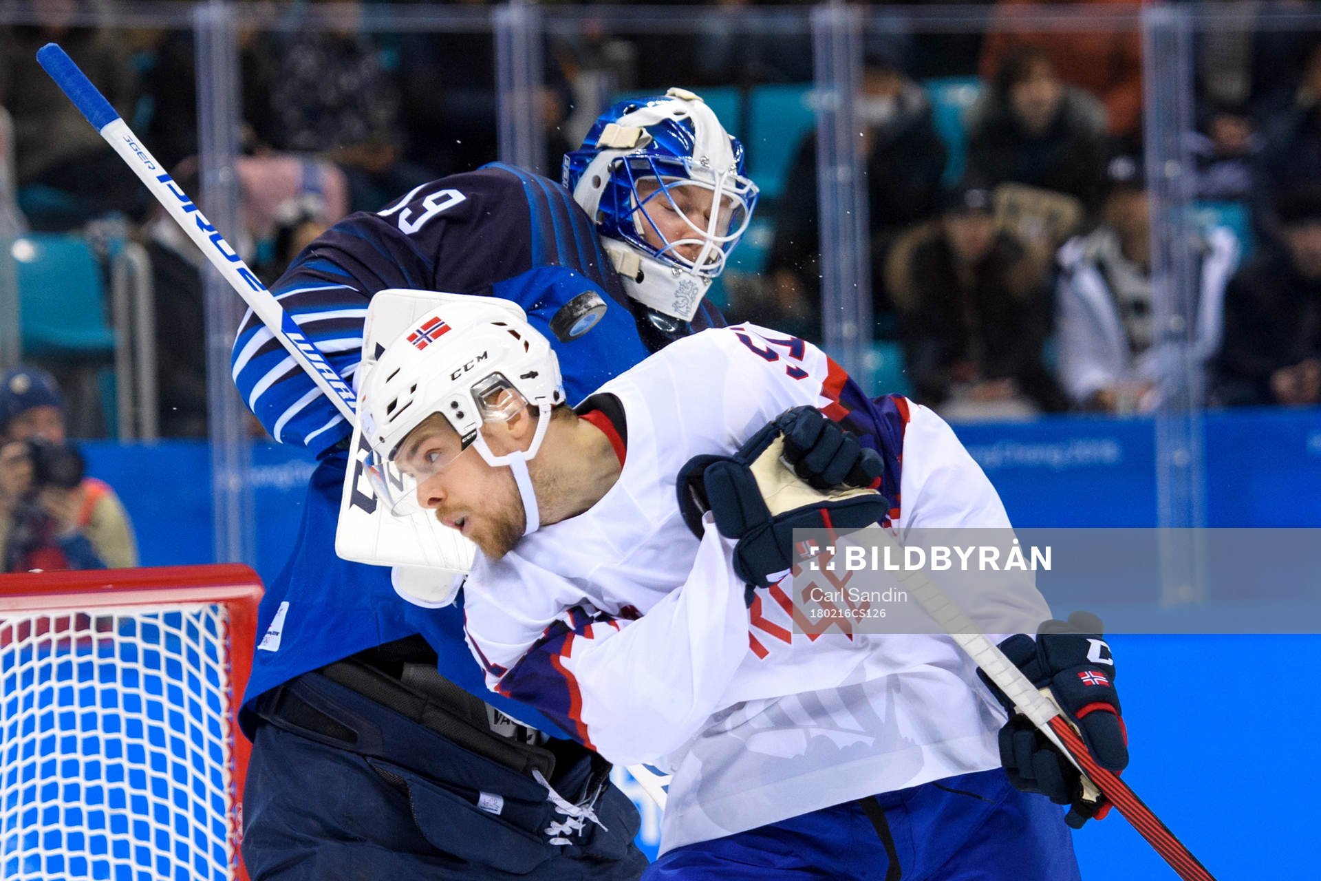 Goaltender Mikko Koskinen of Finland and Mats Rosseli Olsen