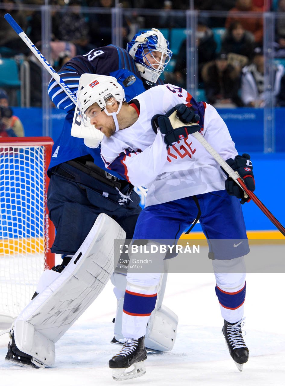 Goaltender Mikko Koskinen of Finland and Mats Rosseli Olsen