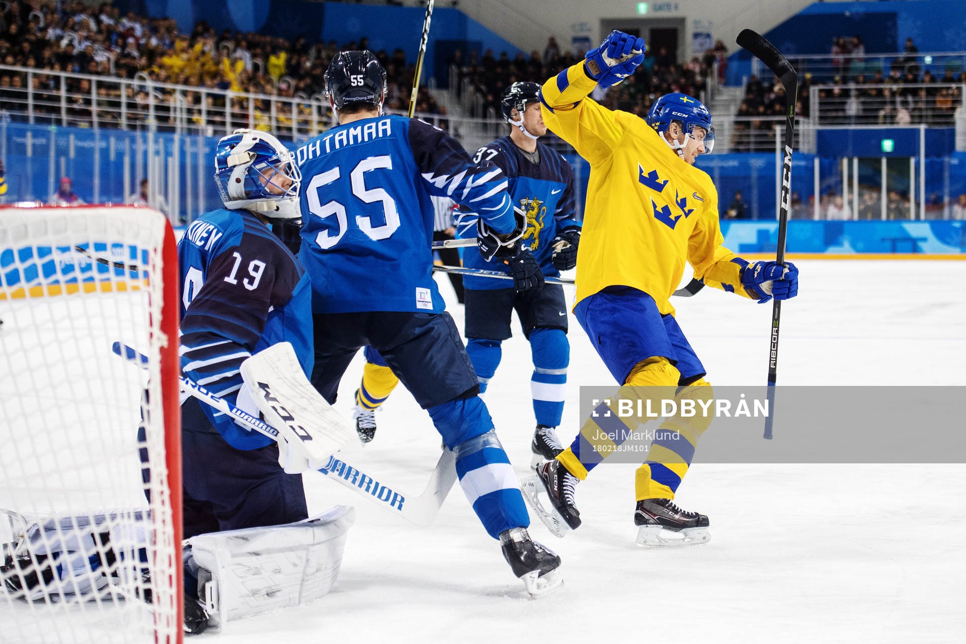 Goaltender Mikko Koskinen of Finland looks dejected while