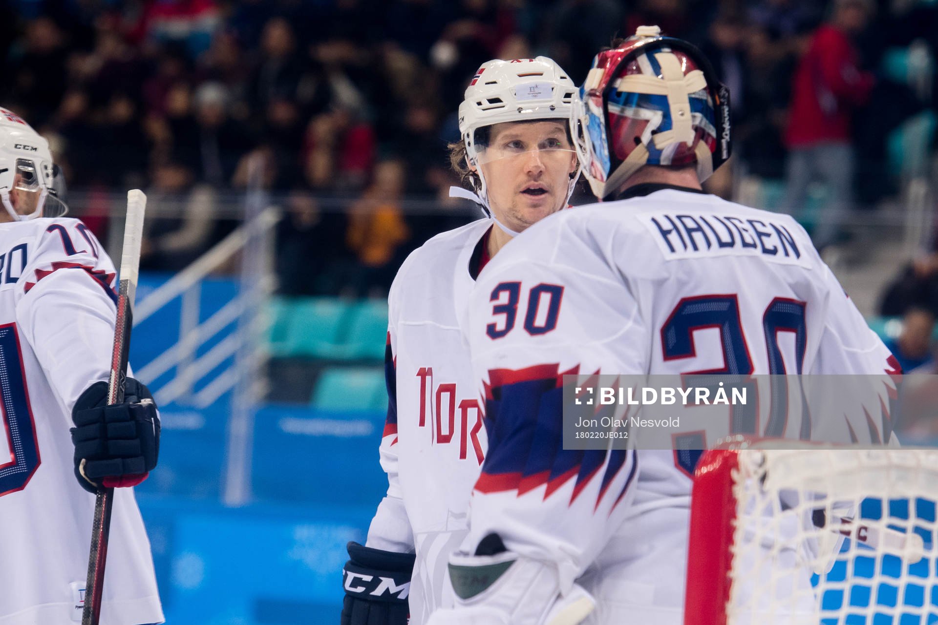 Aleksander Bonsaksen and Goaltender Lars Haugen of Norway