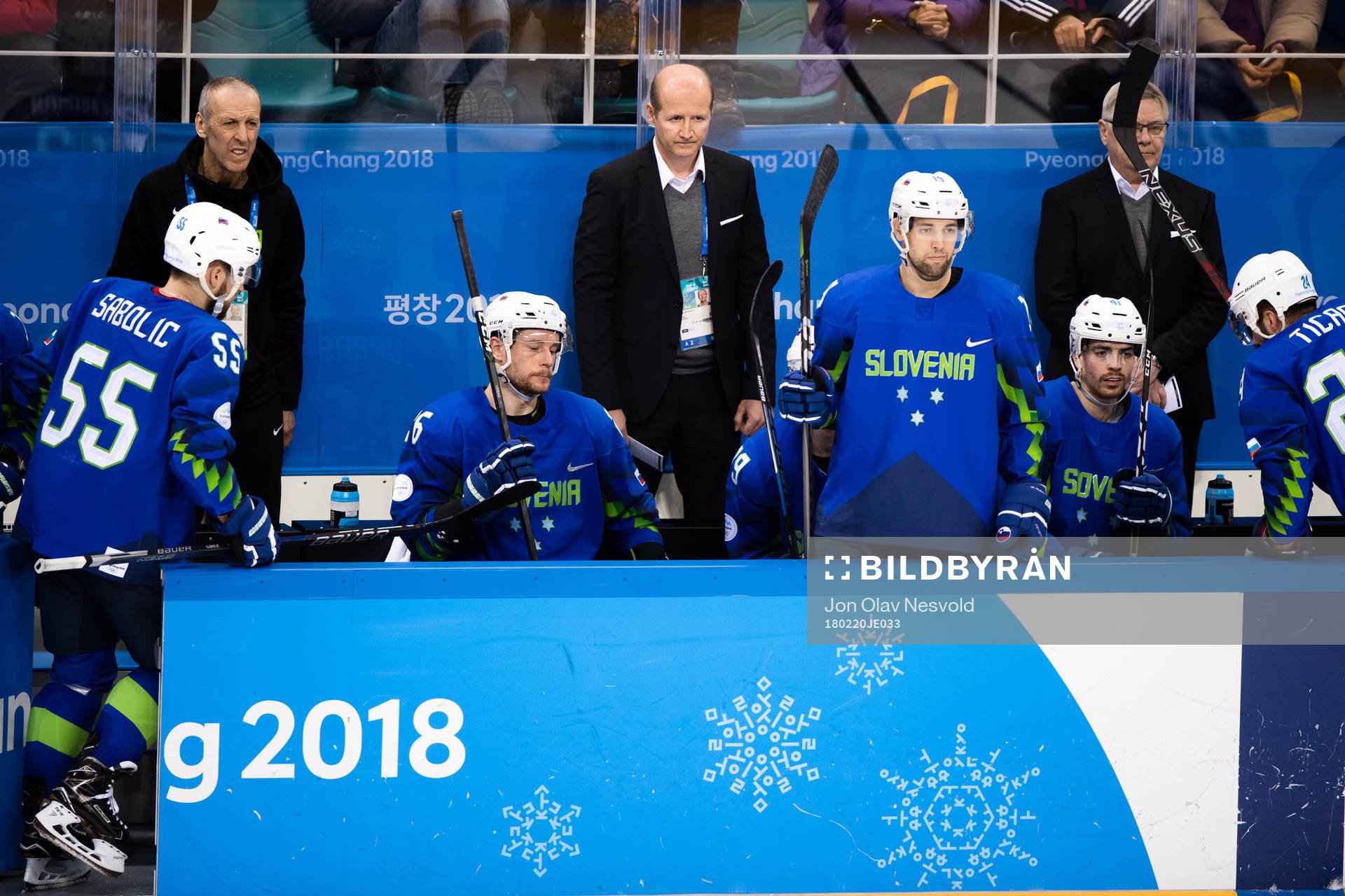 Team Slovenia  looks dejected in the Men's Ice Hockey