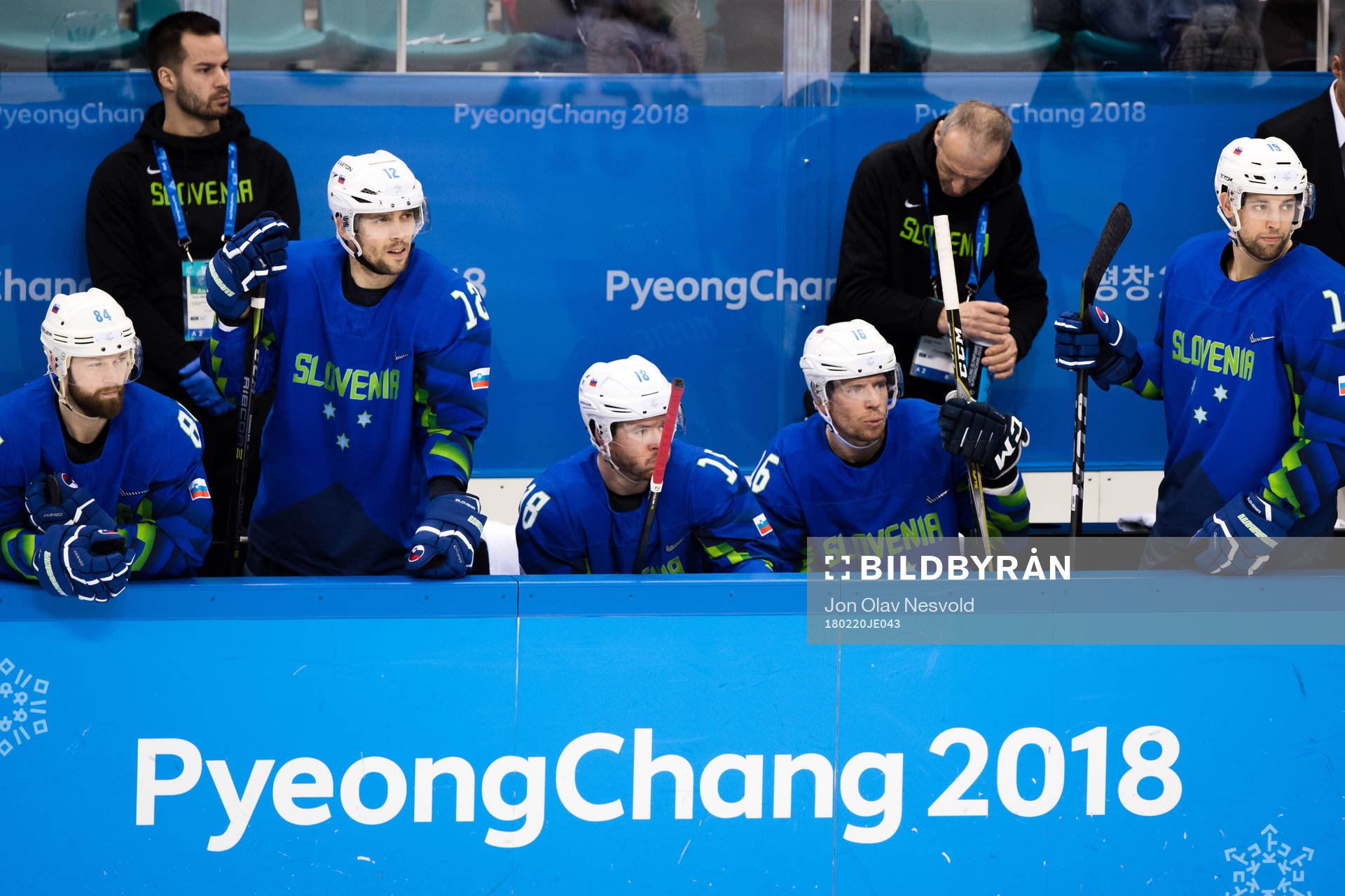 Team Slovenia looks dejected in the Men's Ice Hockey