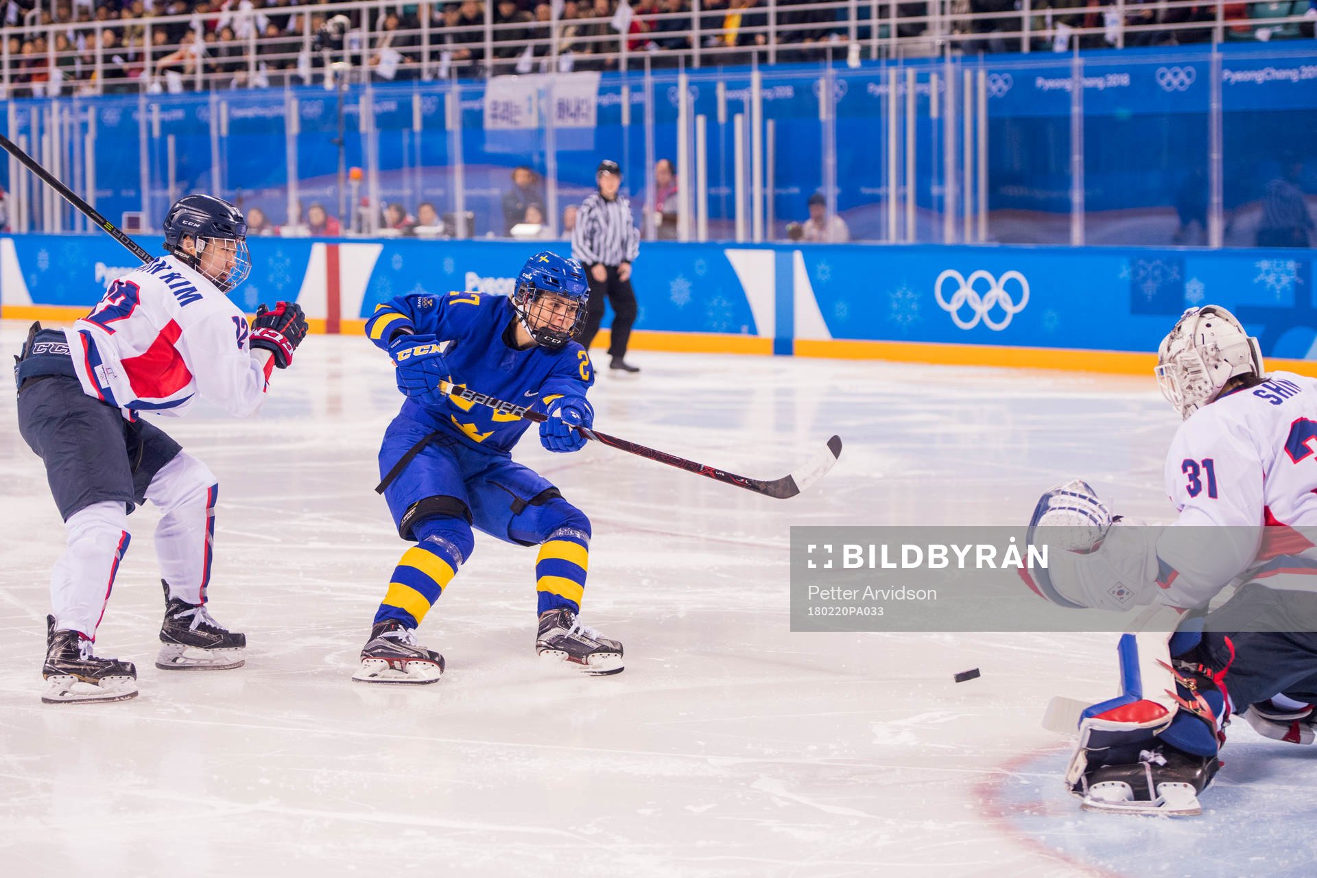 Kim Heenwon of Korea, Emma Nordin of Sweden and goaltender