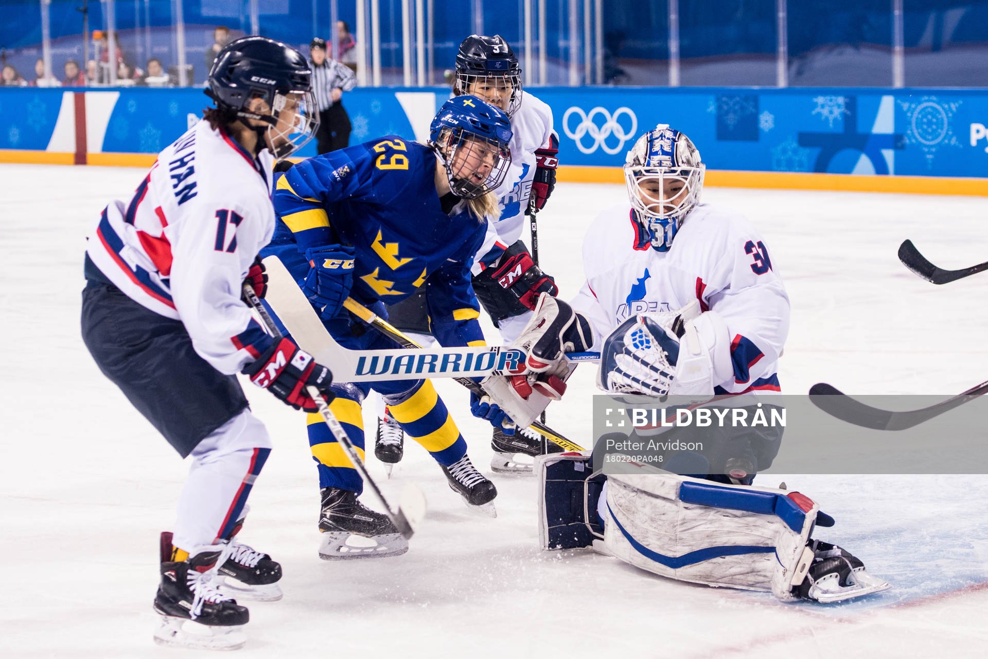 Olivia Carlsson of Sweden in action with Han Soojin of