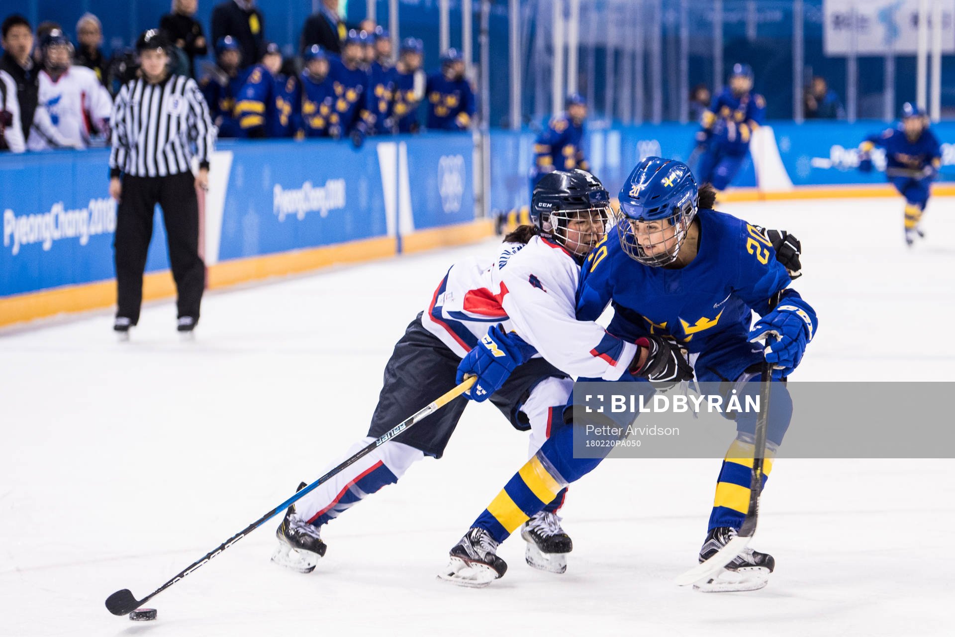 Fanny Rask of Sweden in action with Kim Un Hyang of Korea