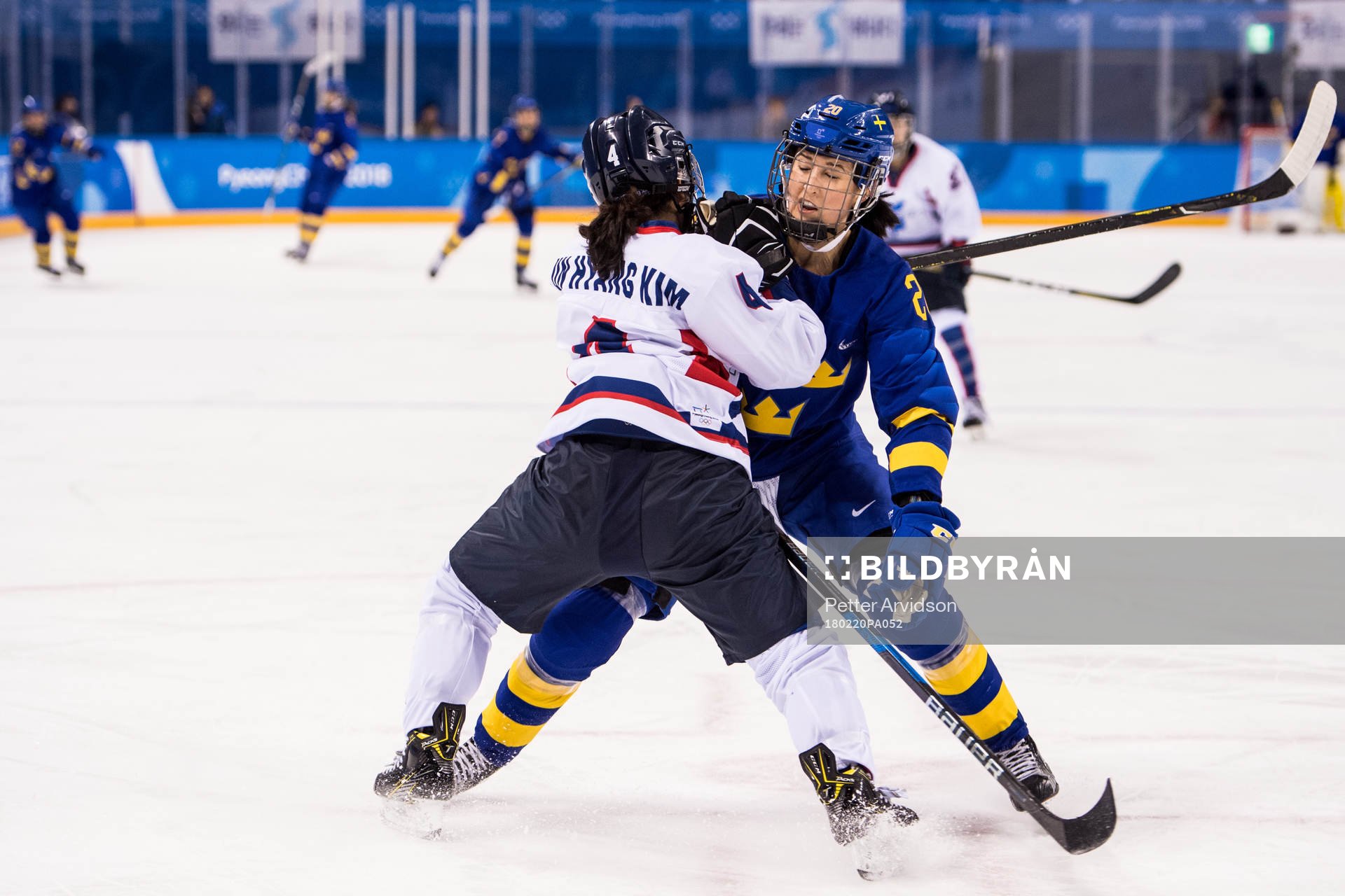 Fanny Rask of Sweden in action with Kim Un Hyang of Korea