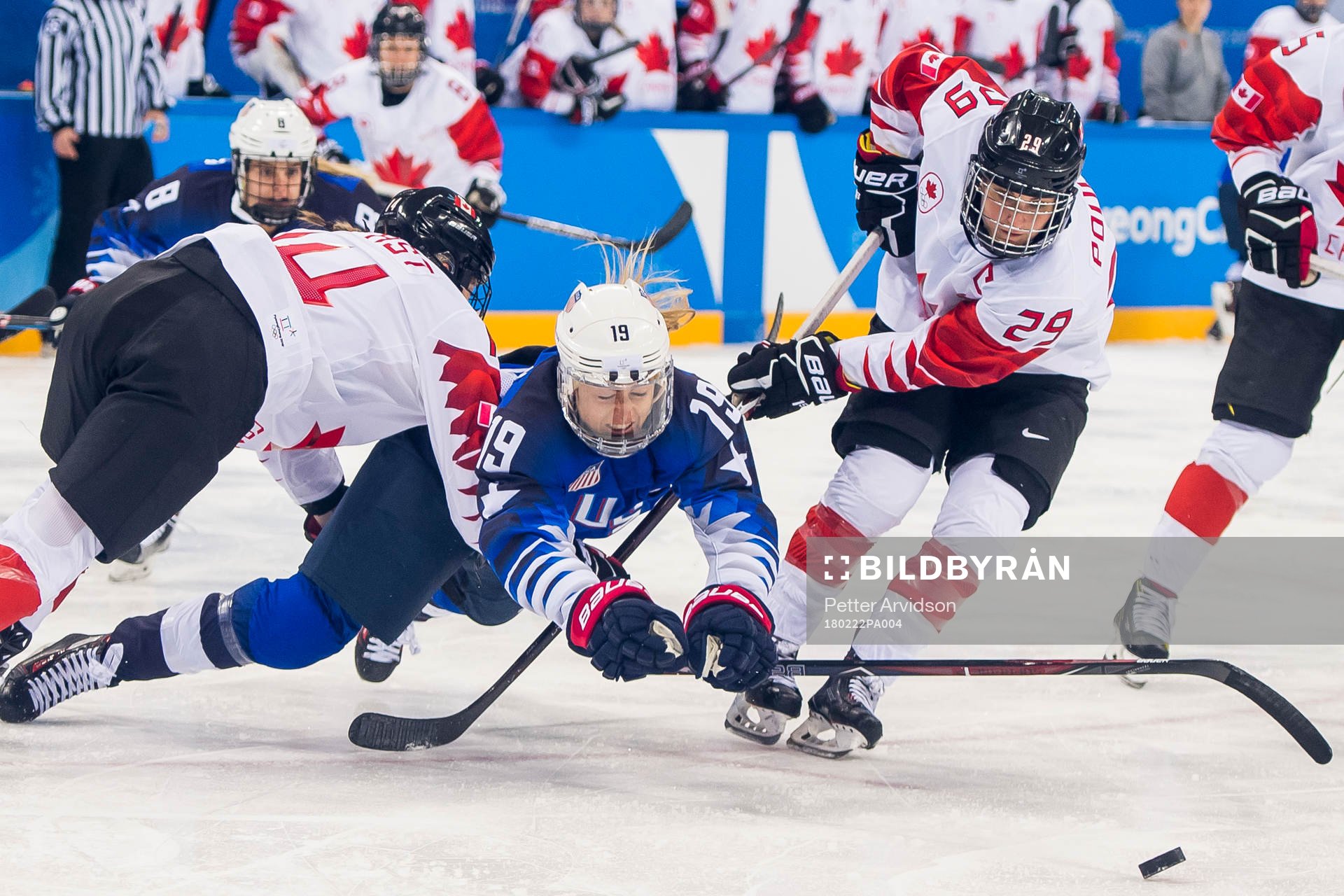 Renata Fast of Canada, Gigi Marvin of USA and Marie-Philip