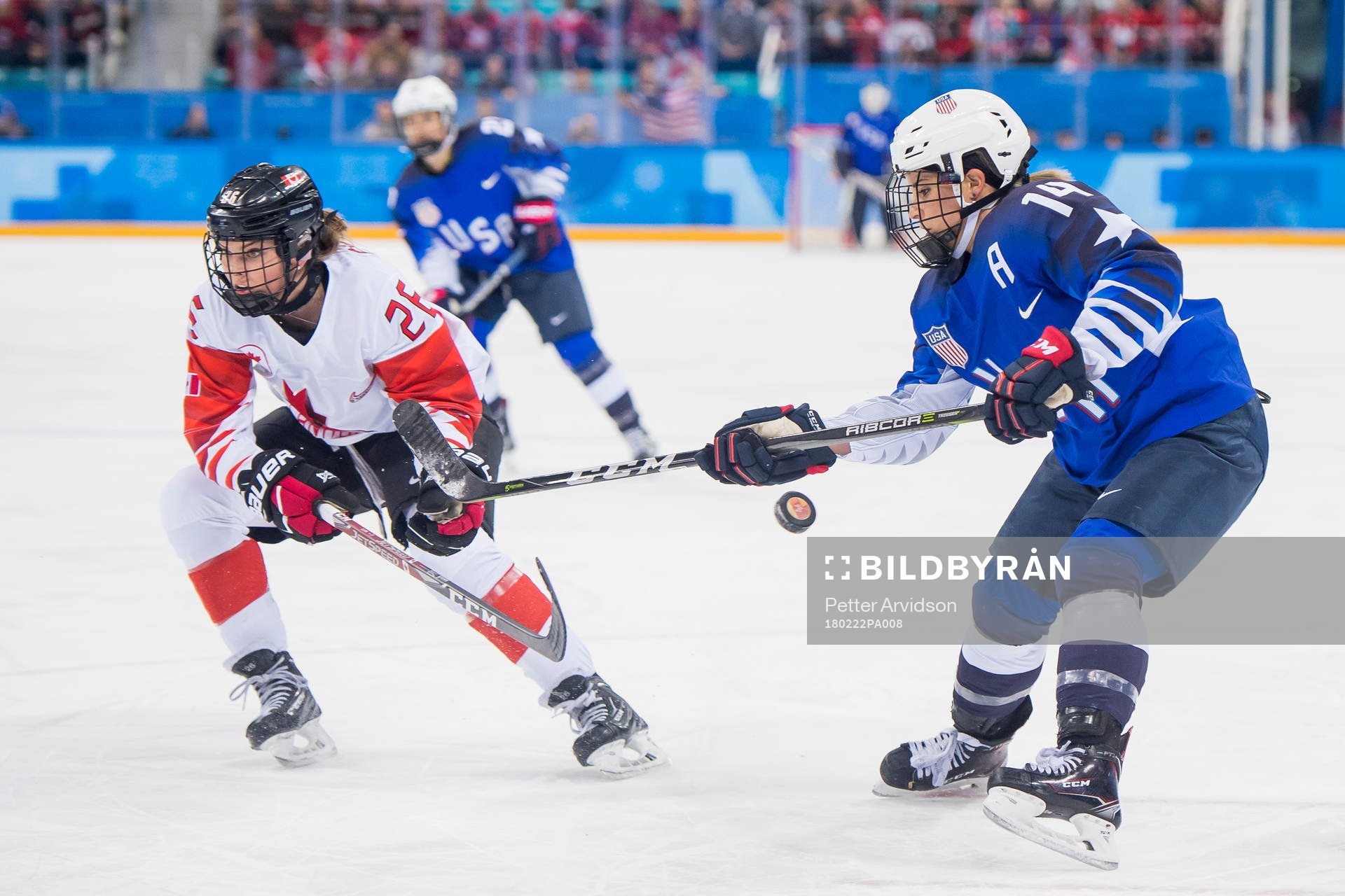 Brianna Decker of USA and Emily Clark of Canada