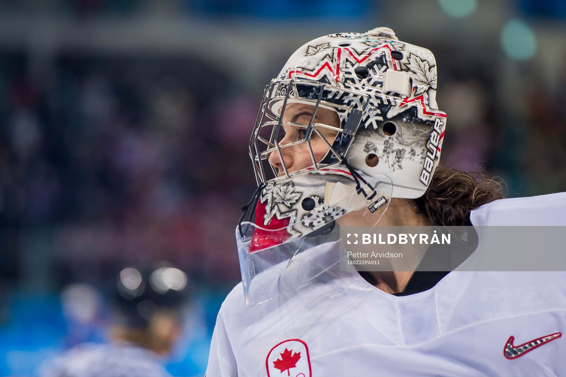 Goaltender Shannon Szabados of Canada looks dejected