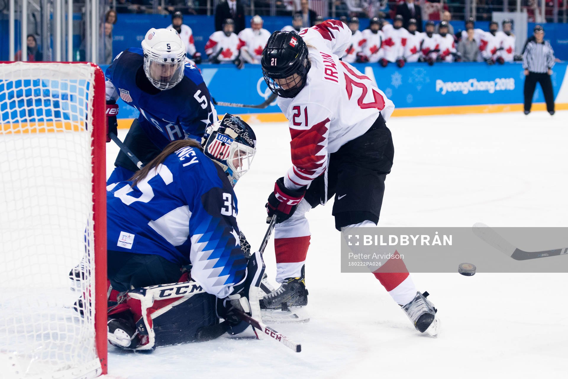 Haley Irwin of Canada against Megan Keller and Goalkeeper