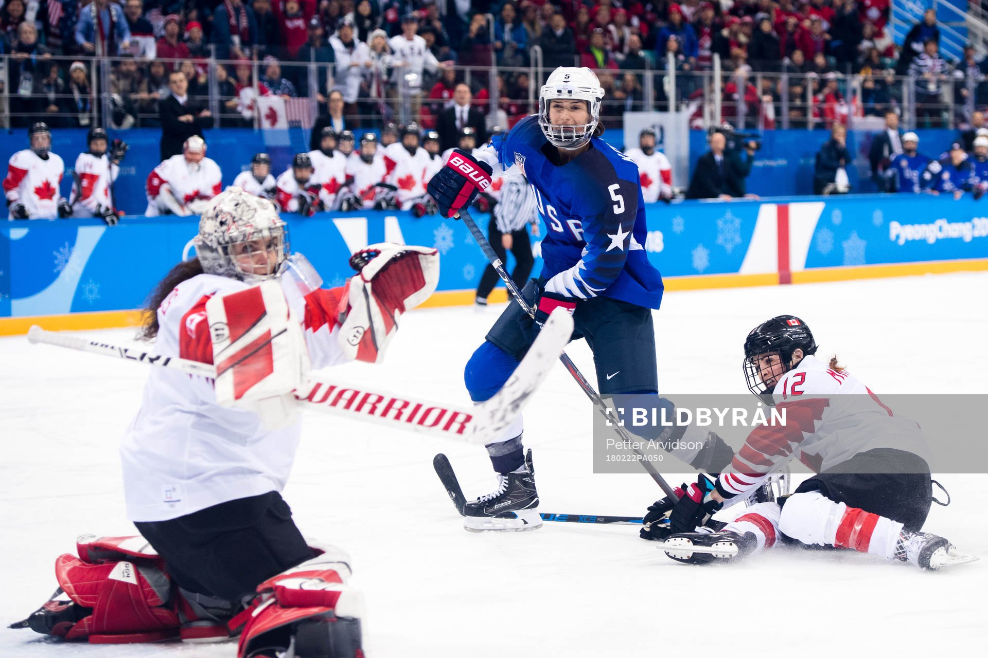 Megan Keller of USA against Goalkeeper Shannon Szabados and