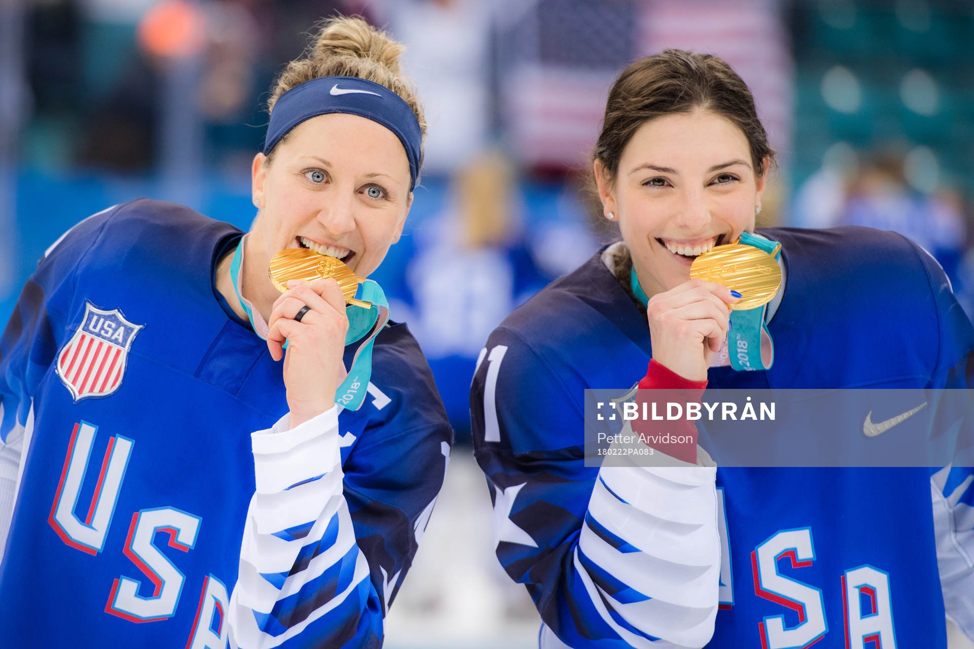 Meghan Duggan and Hilary Knight of USA celebrates
