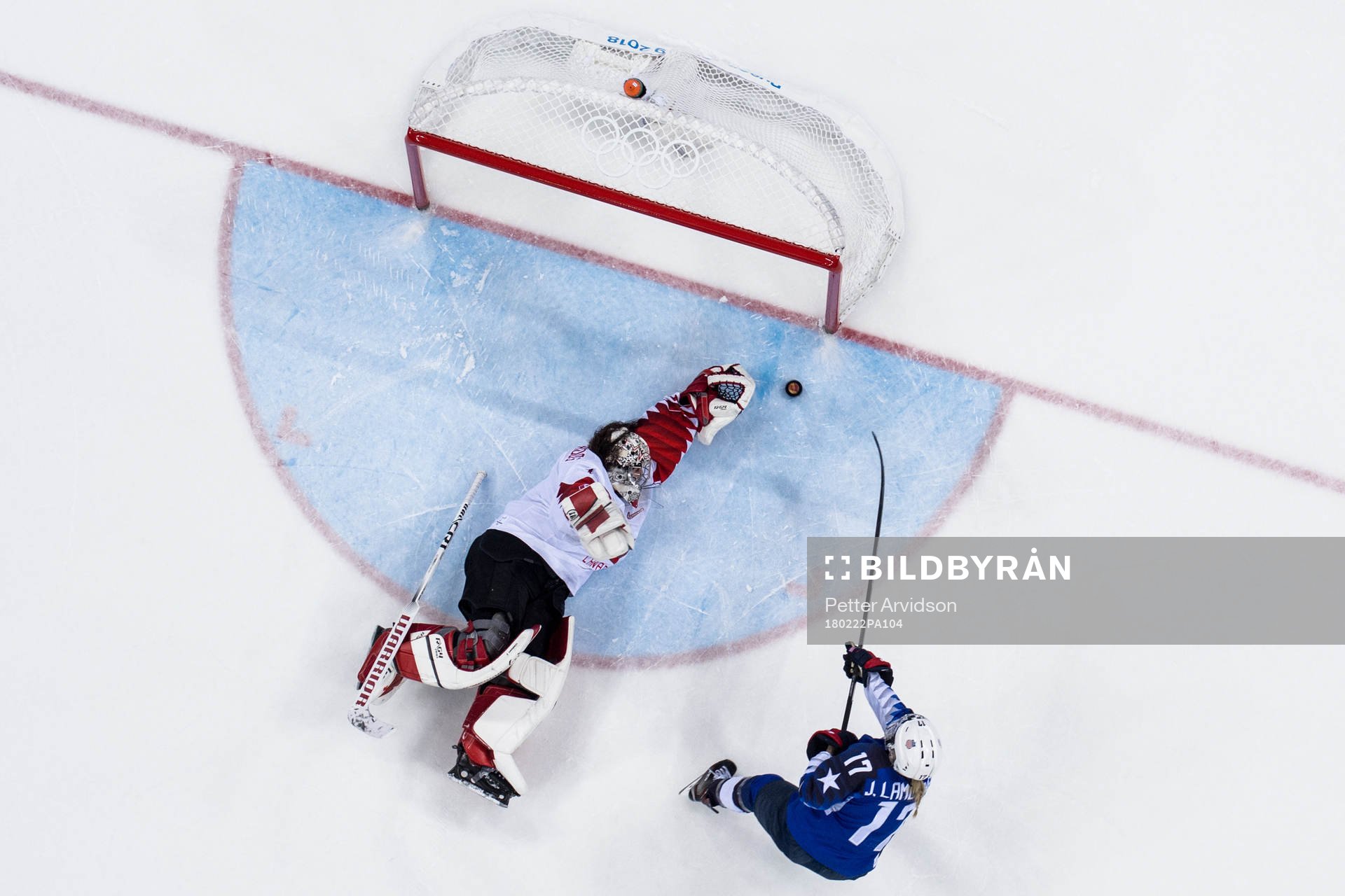 Jocelyne Lamoureux Davidson of USA scores against