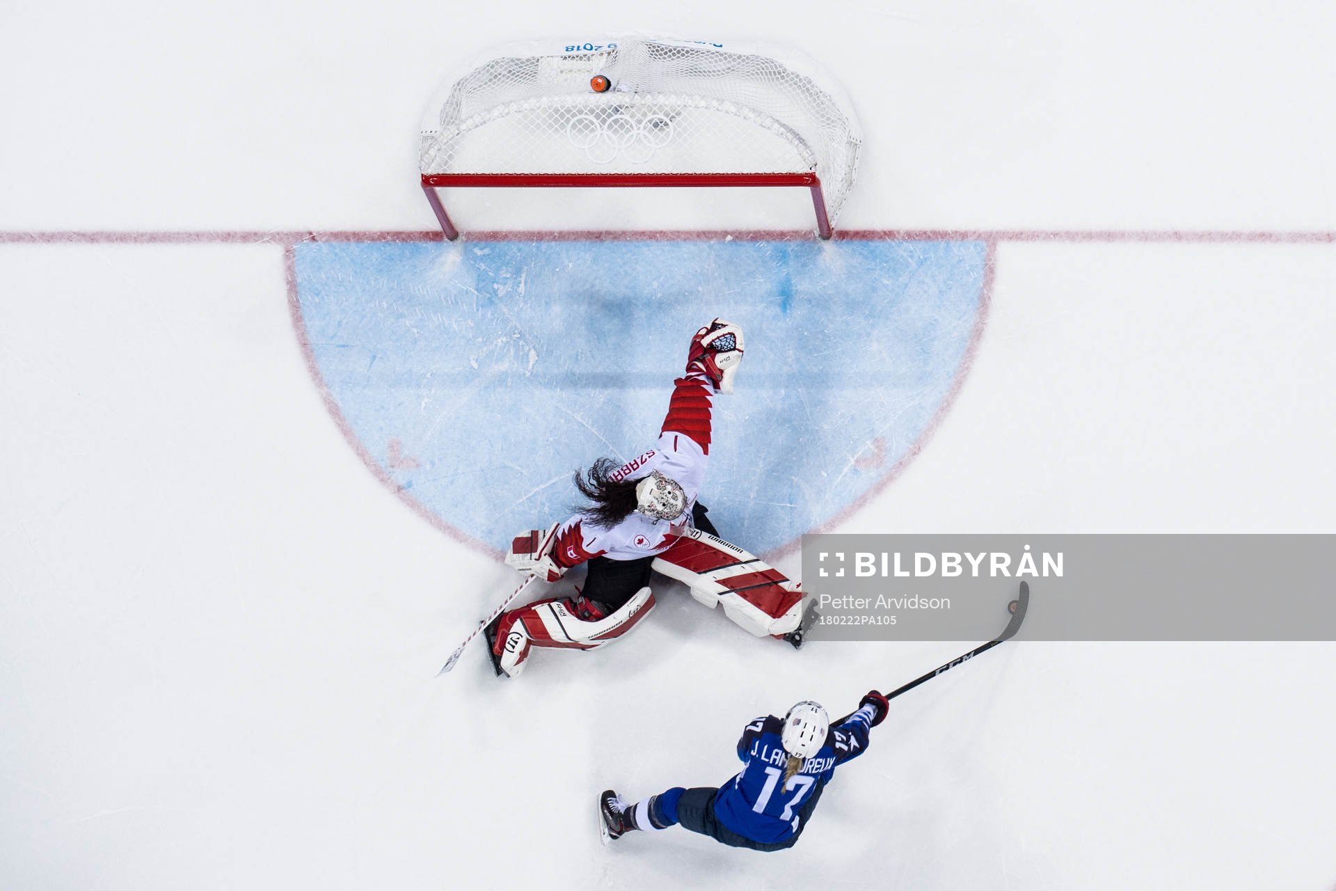 Jocelyne Lamoureux Davidson of USA scores against