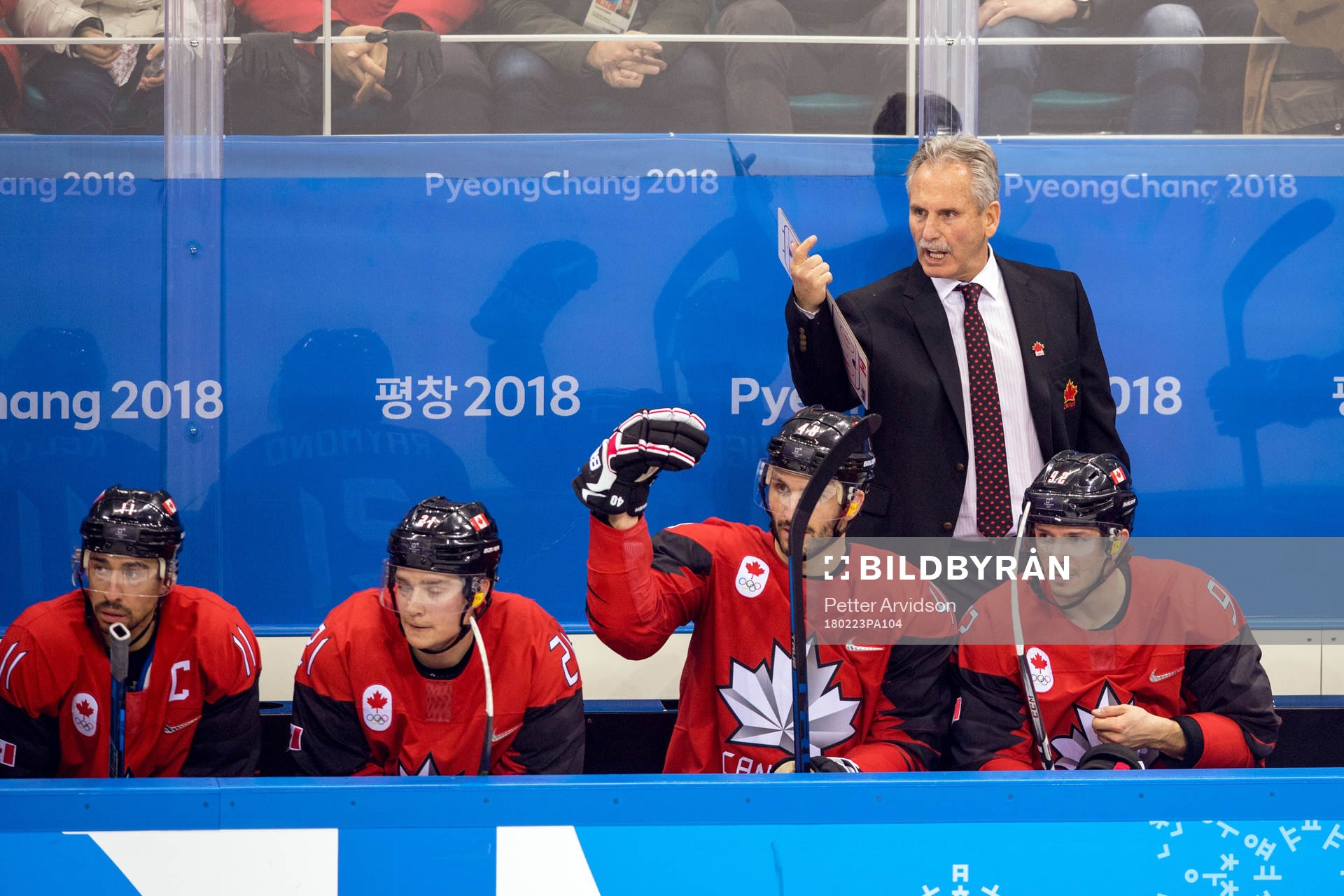 Canada's head coach Willie Desjardins looks dejected in the