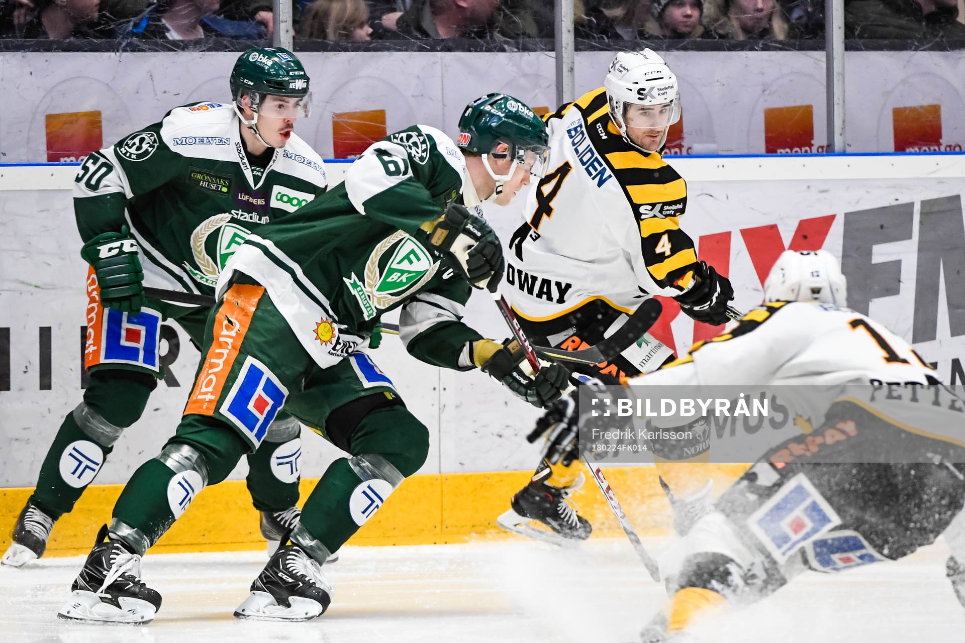 Färjestads Sebastian Erixon och Skellefteås Bud Holloway