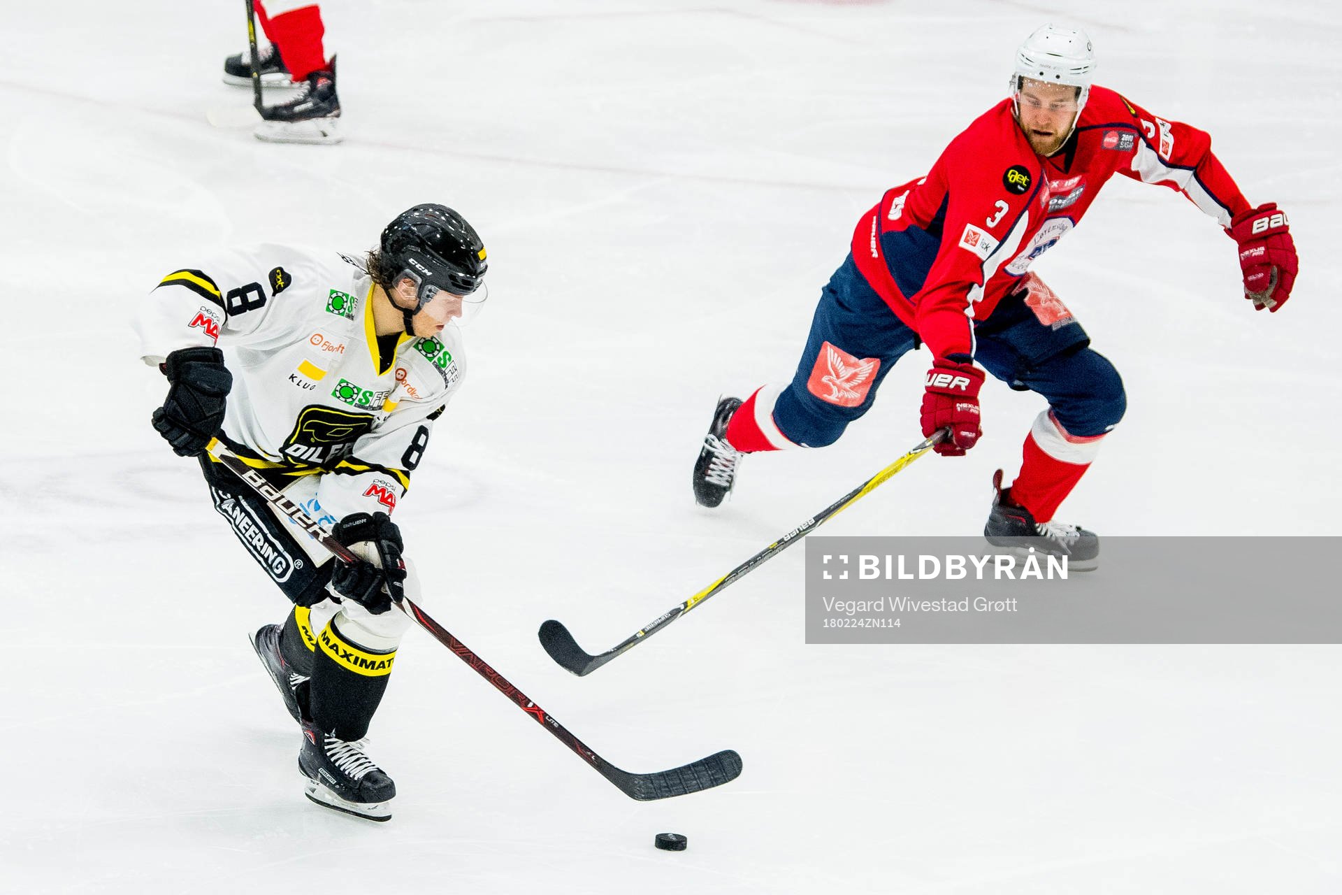 Mathias Trettenes of Stavanger Oilers and Martin Rainer