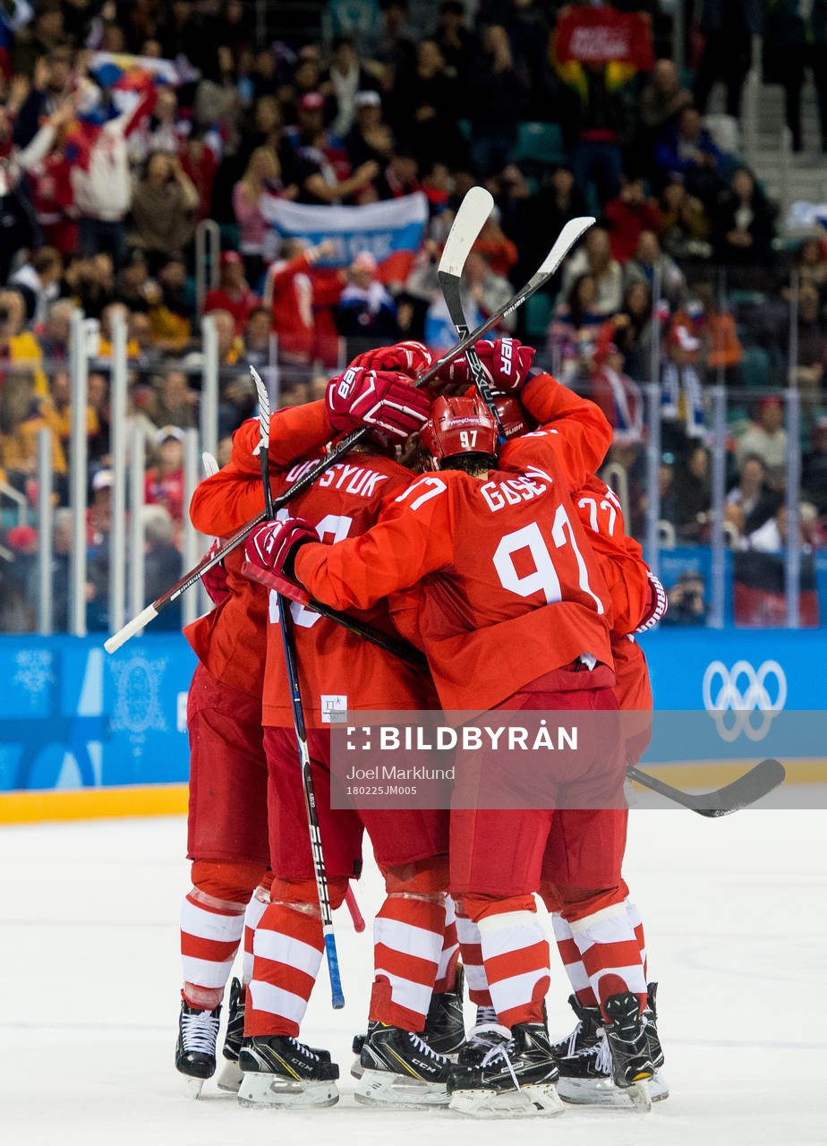 Vyacheslav Voinov of Russia (OAR) celebrates with teammates