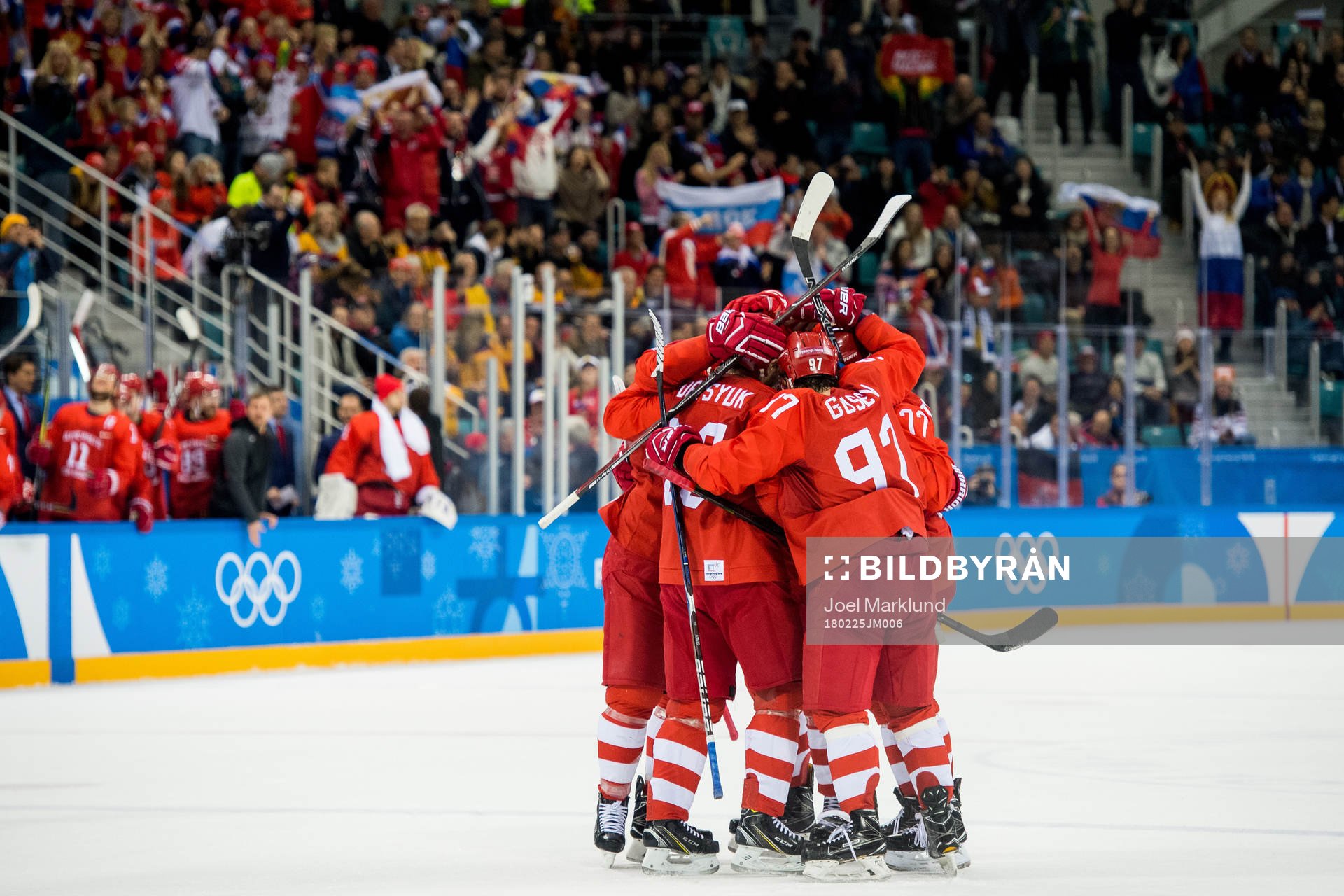 Vyacheslav Voinov of Russia (OAR) celebrates with teammates
