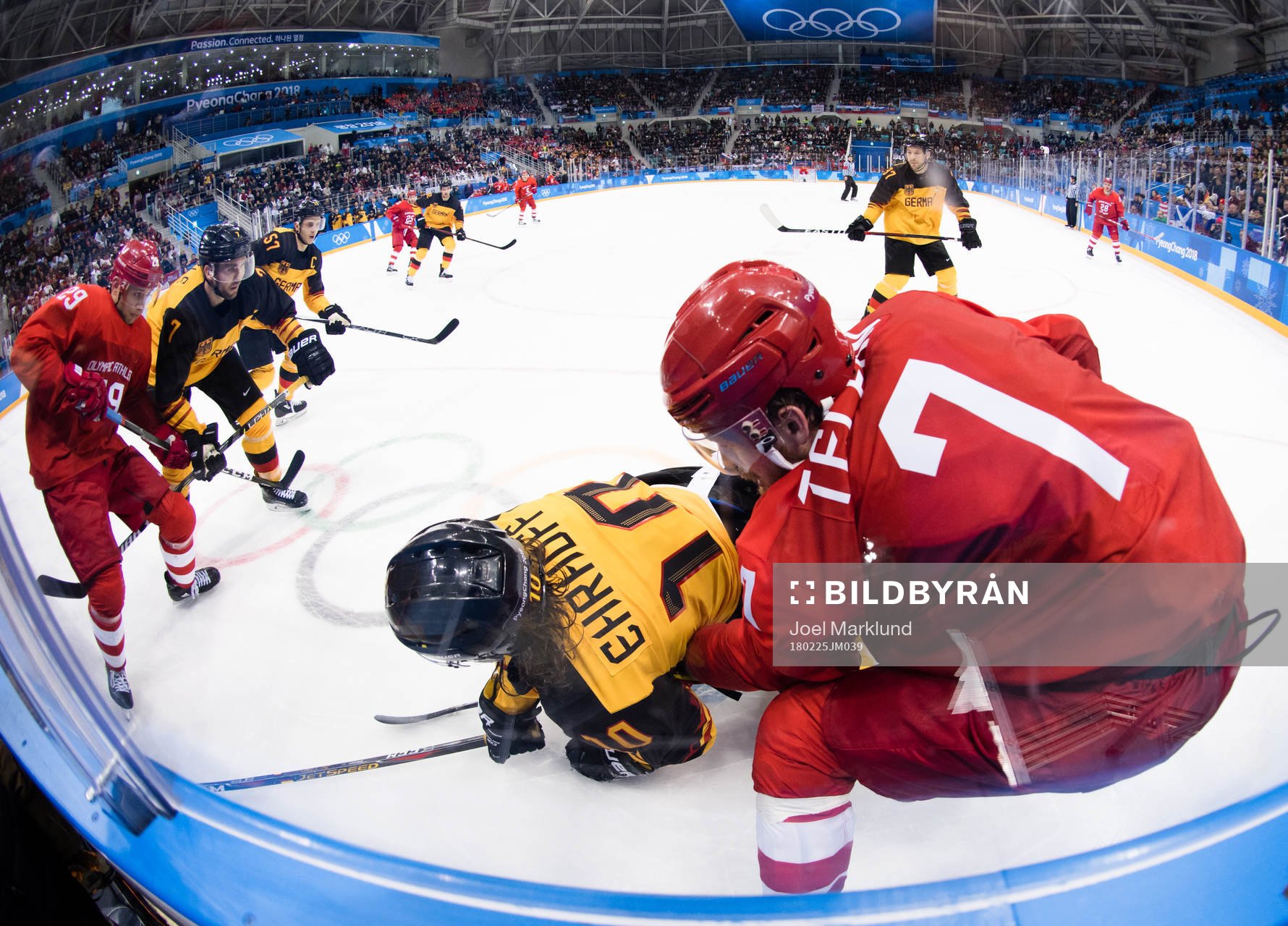 Christian Ehrhoff of Germany and Ivan Telegin Of Russia