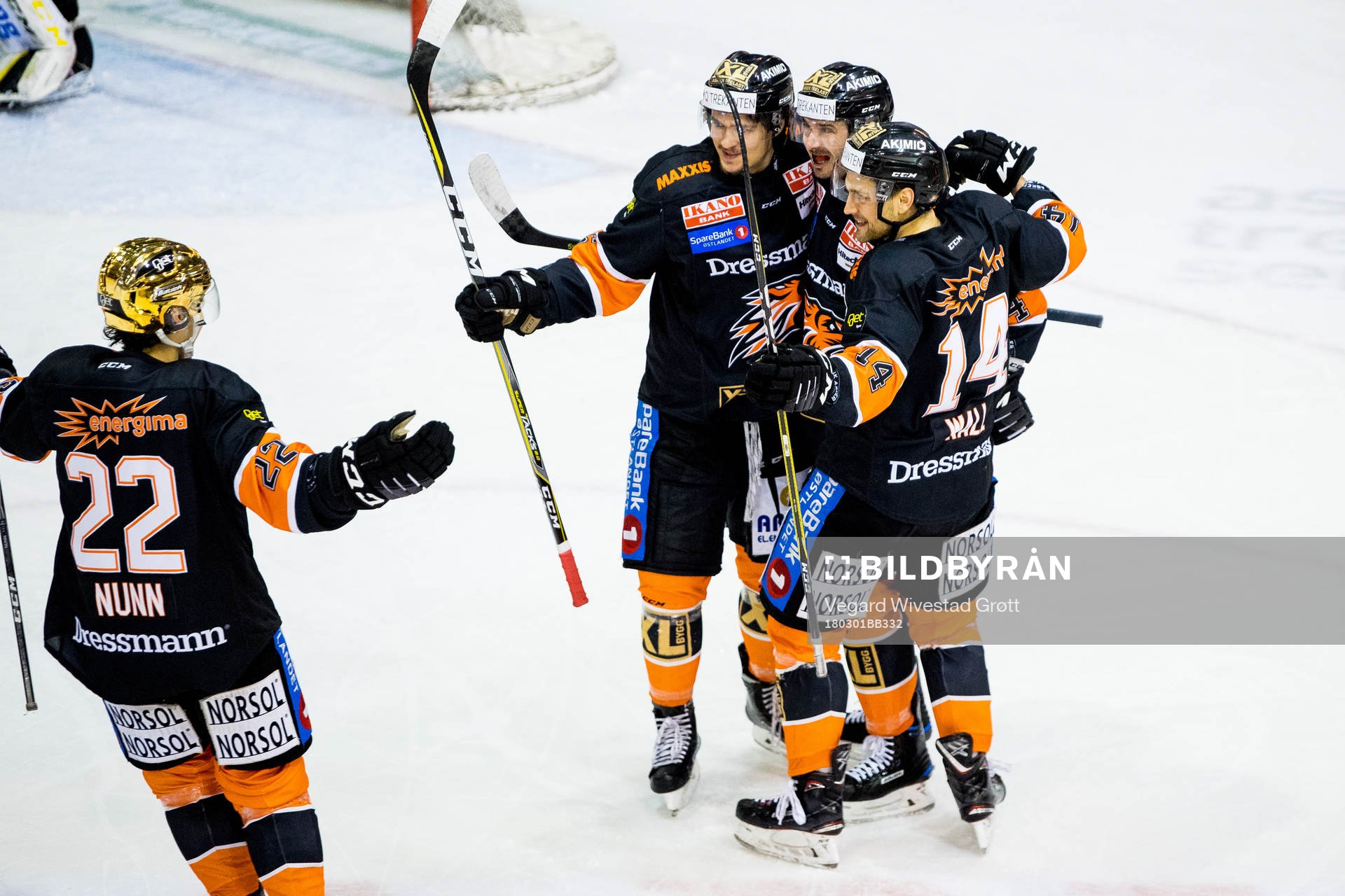 Nick Pageau of Frisk Asker celebrates with teammates