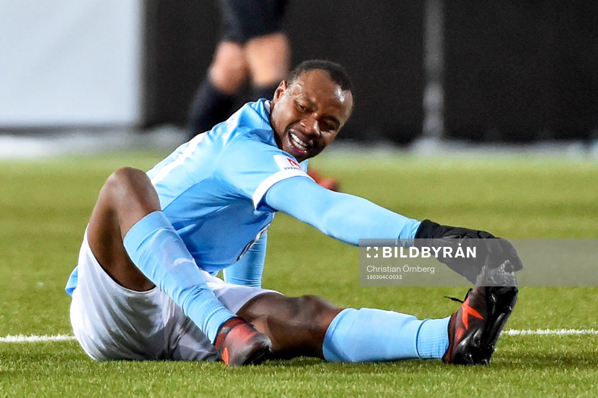 Malmö FFs Carlos Strandberg grinar illa